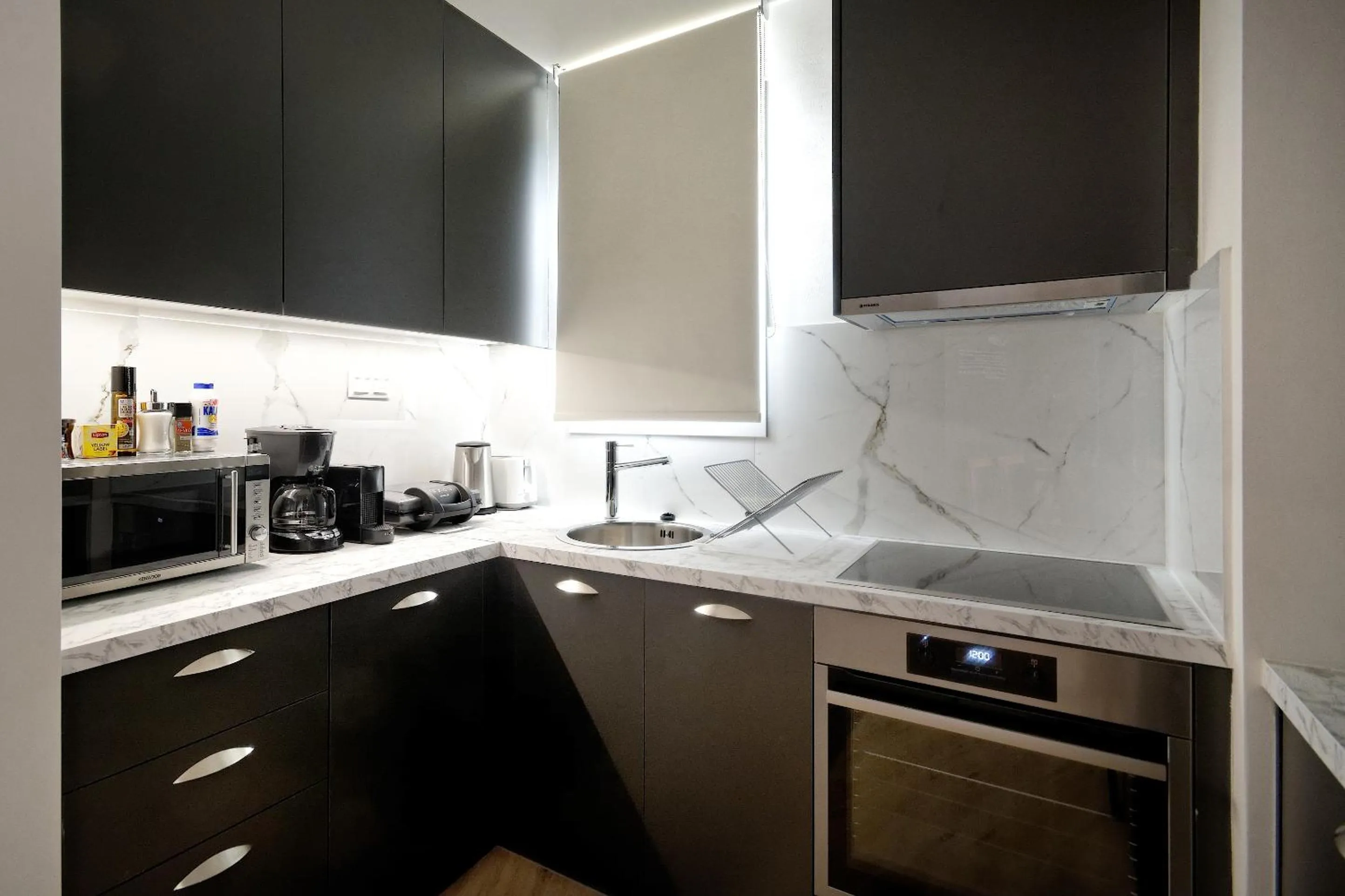 Kitchen or kitchenette in Odyssey Residence