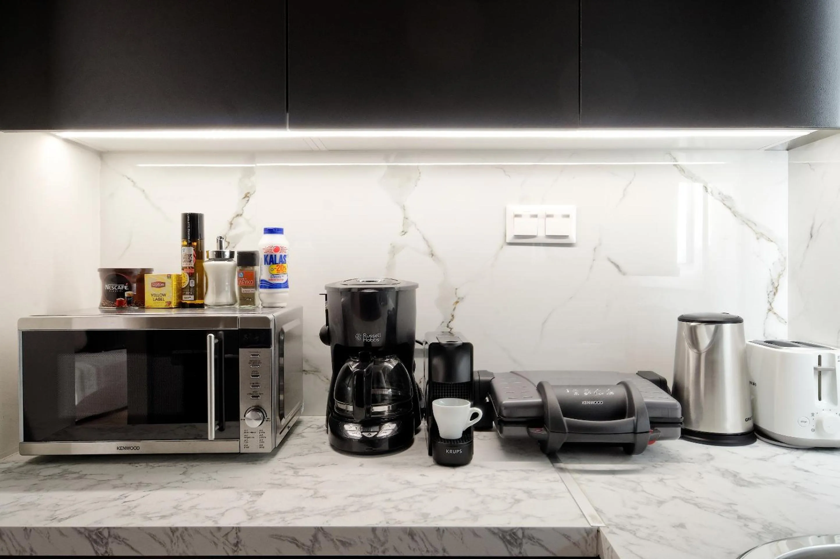 Coffee/tea facilities in Odyssey Residence