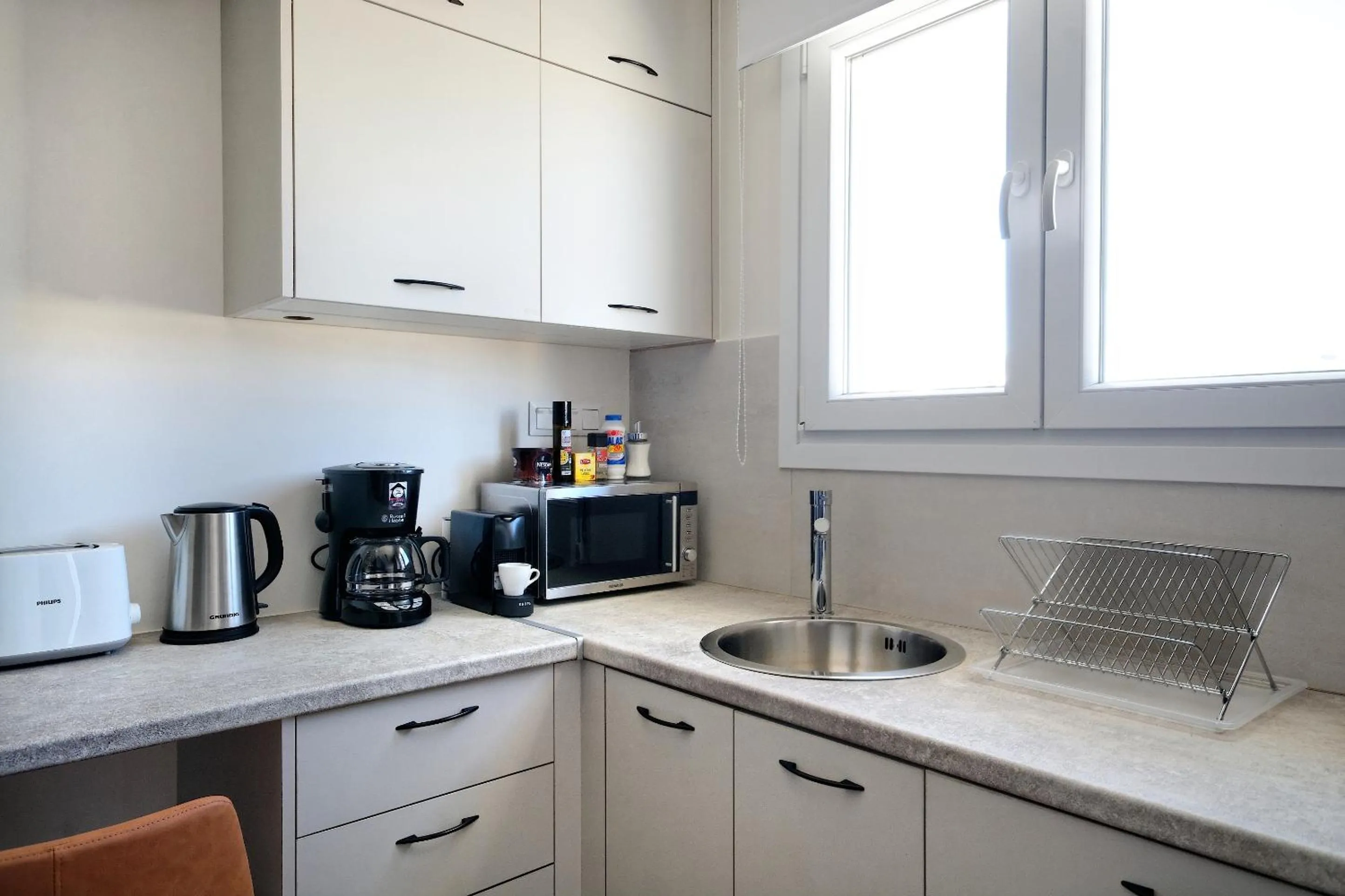Coffee/tea facilities in Odyssey Residence