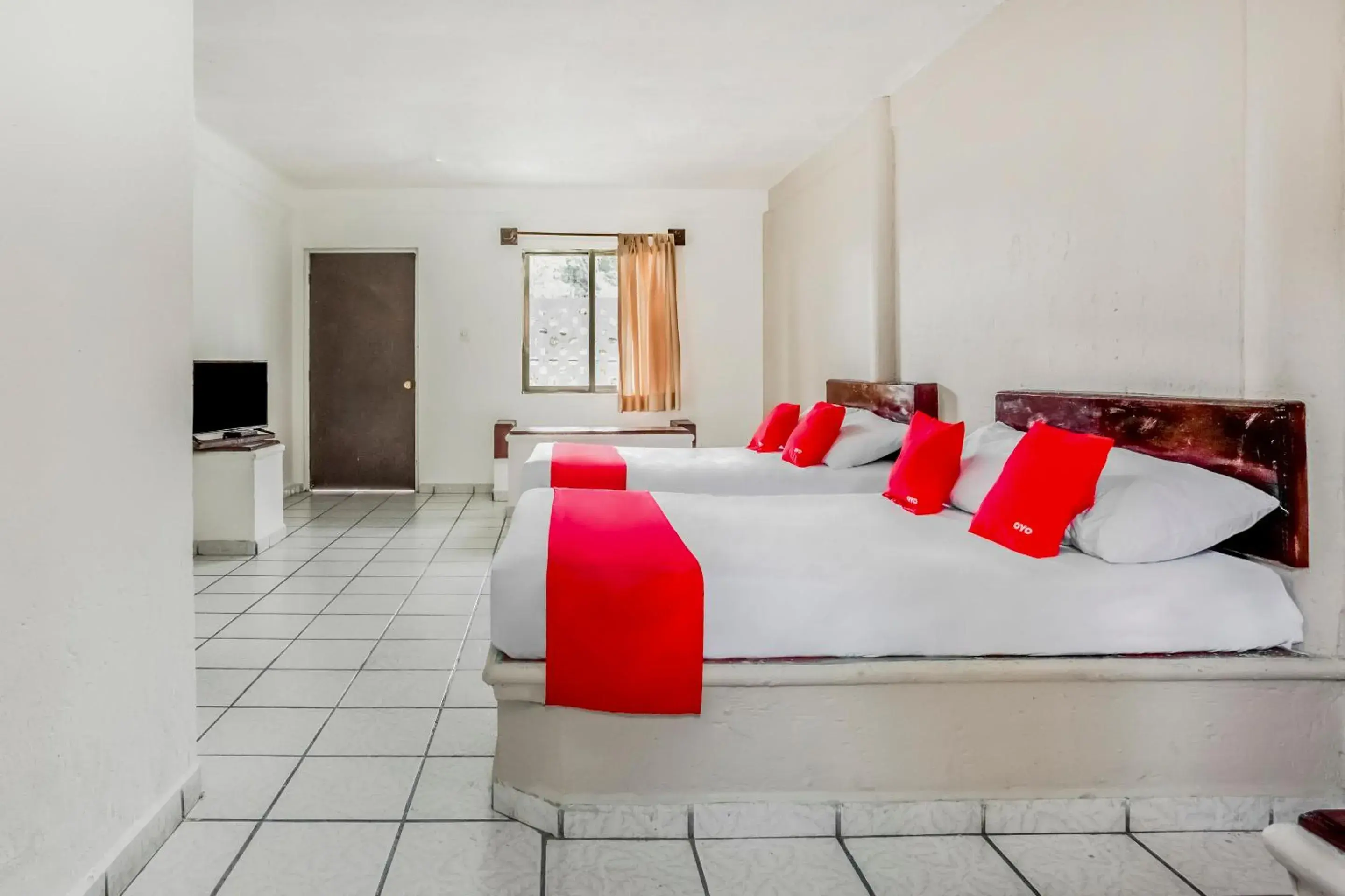 Bedroom in OYO Hotel Jaguar Bedroom in OYO Hotel Jaguar