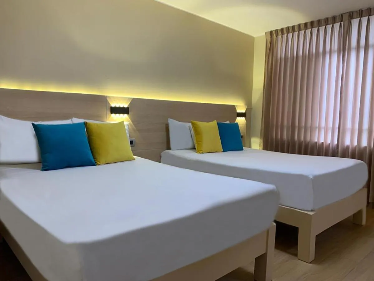 Triple Room in Acuario Hotel & Suite