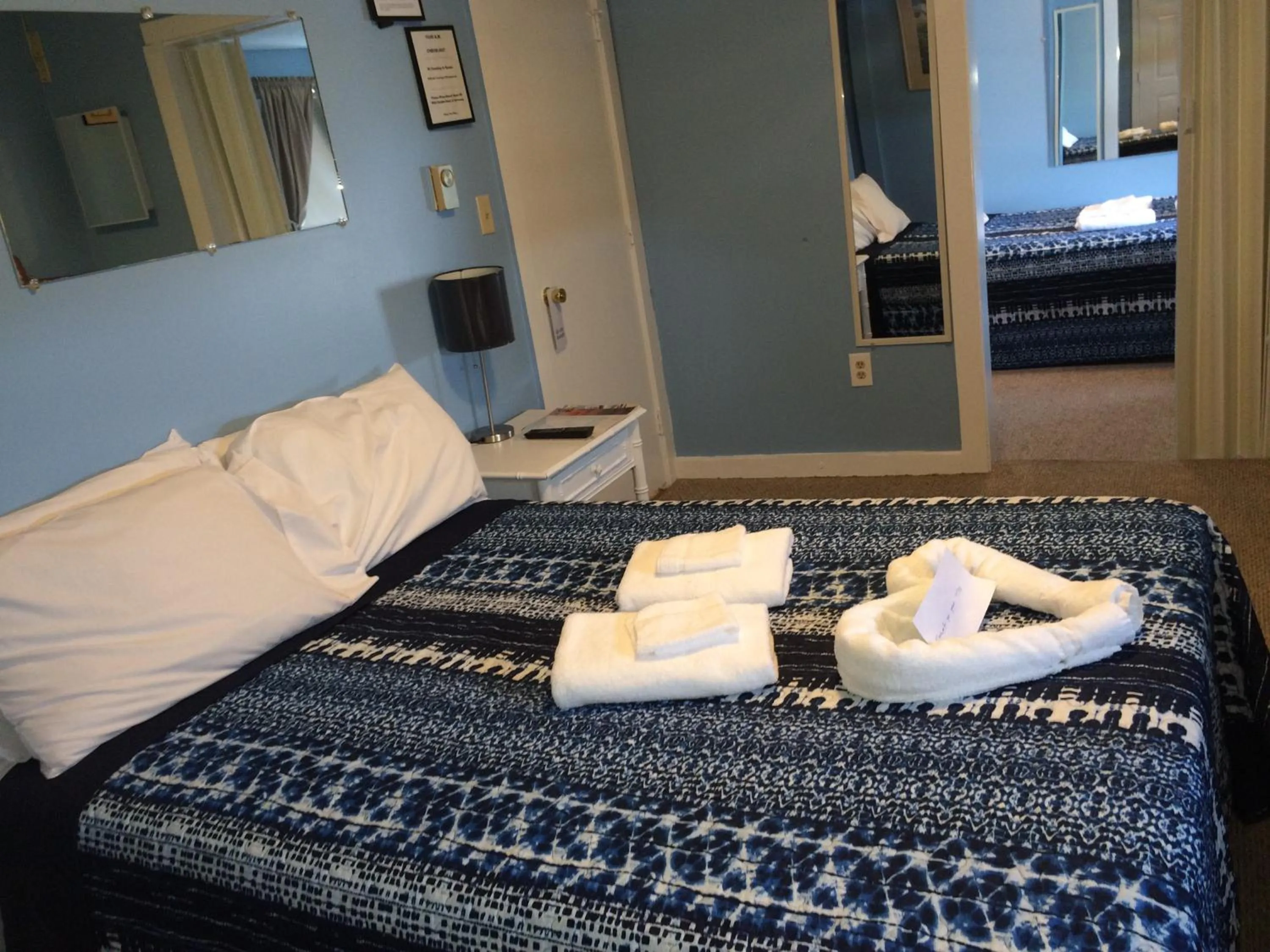 Bed in The New Oceanic Inn