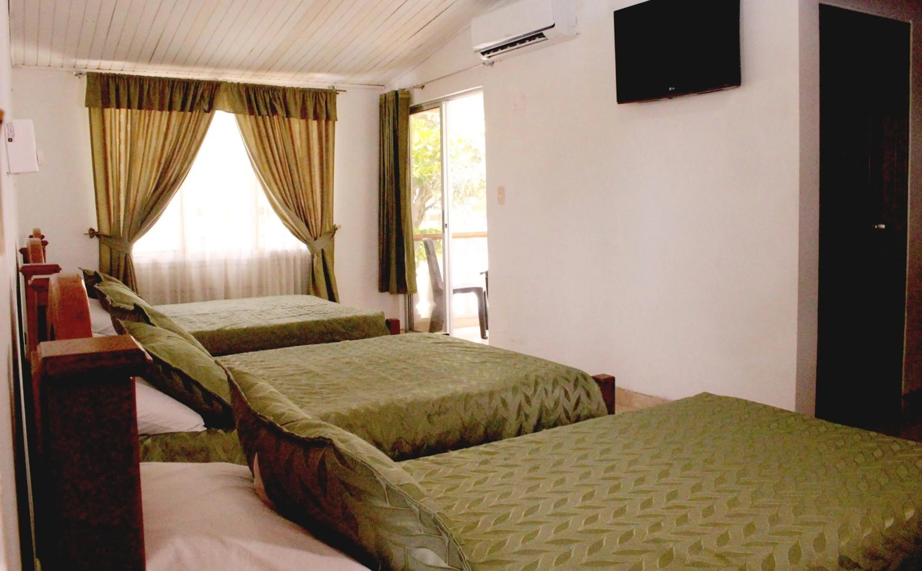 Bed in Alborada Hotel Melgar