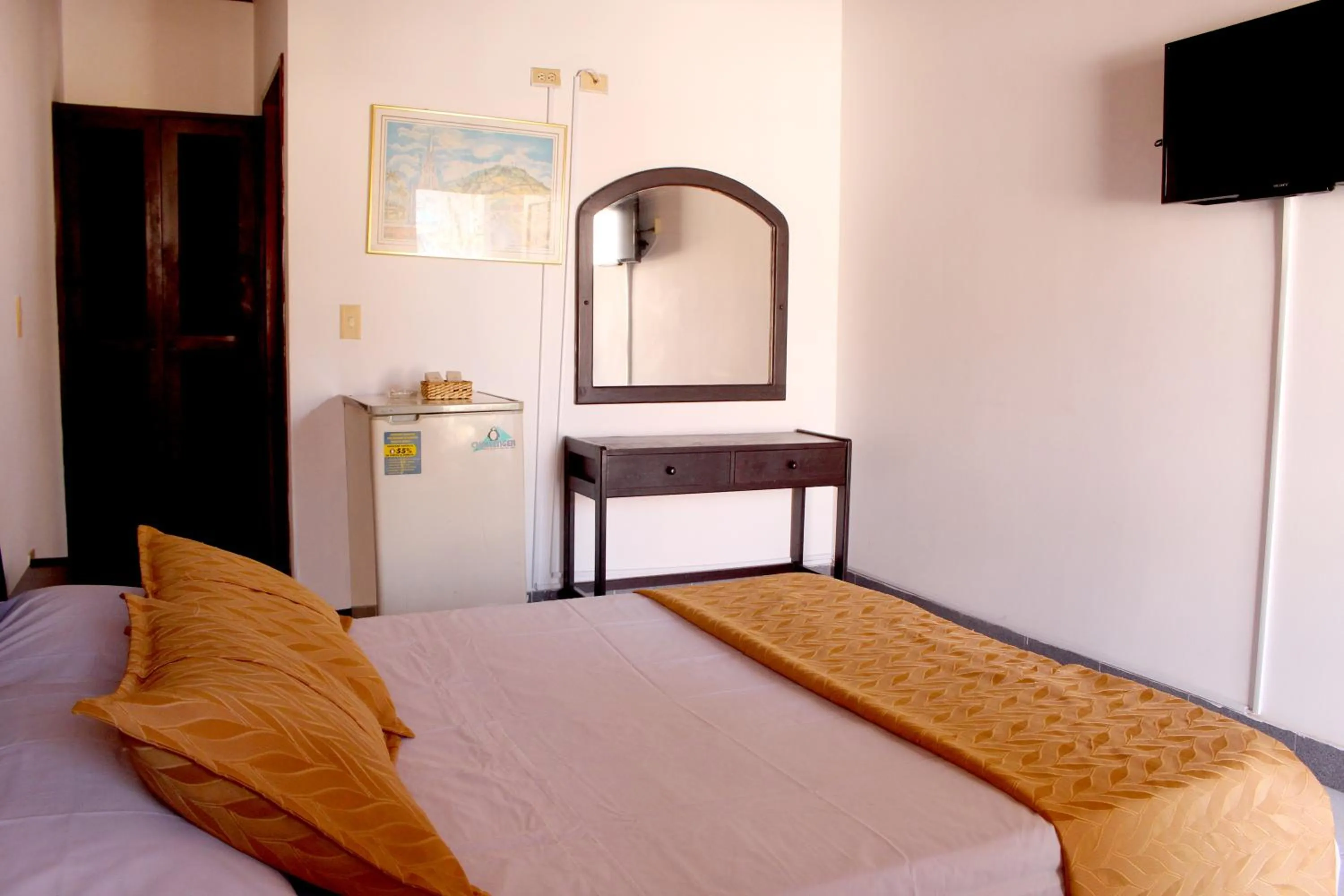 Photo of the whole room, Bed in Alborada Hotel Melgar
