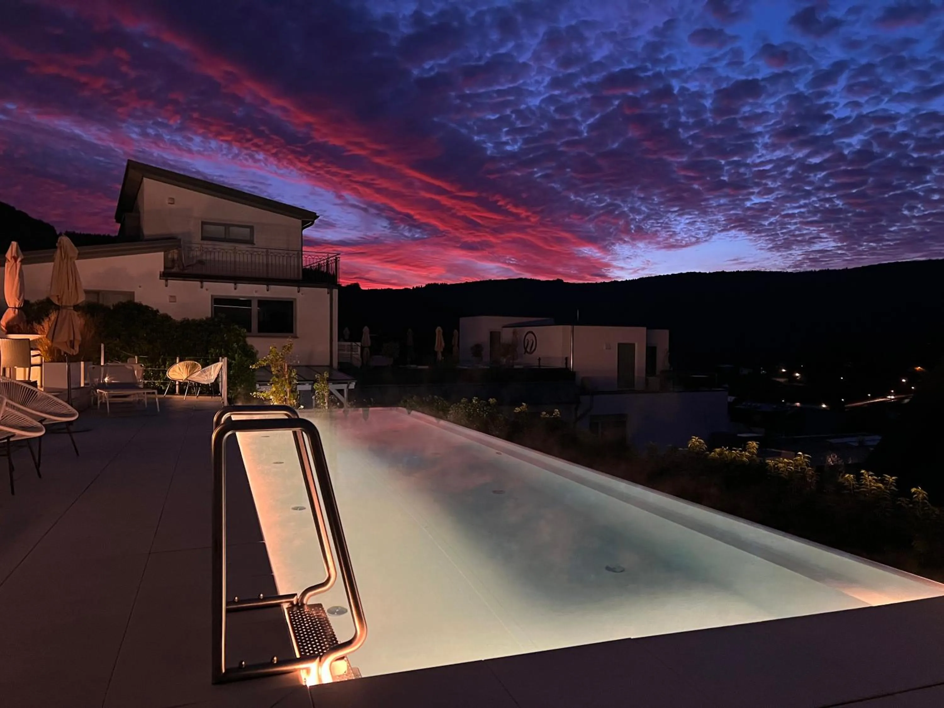 Swimming pool in Weingut-Aparthotel Olinger