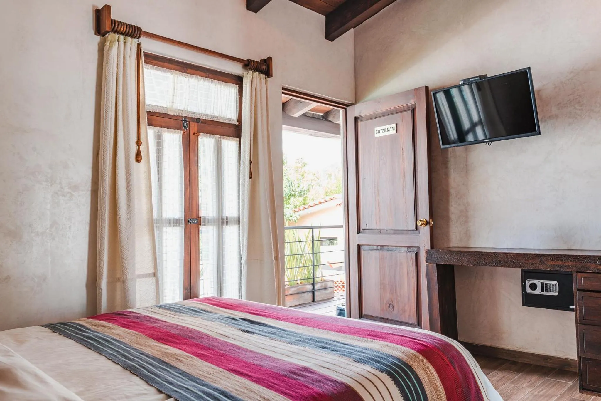 Bed in Yox Hotel Boutique