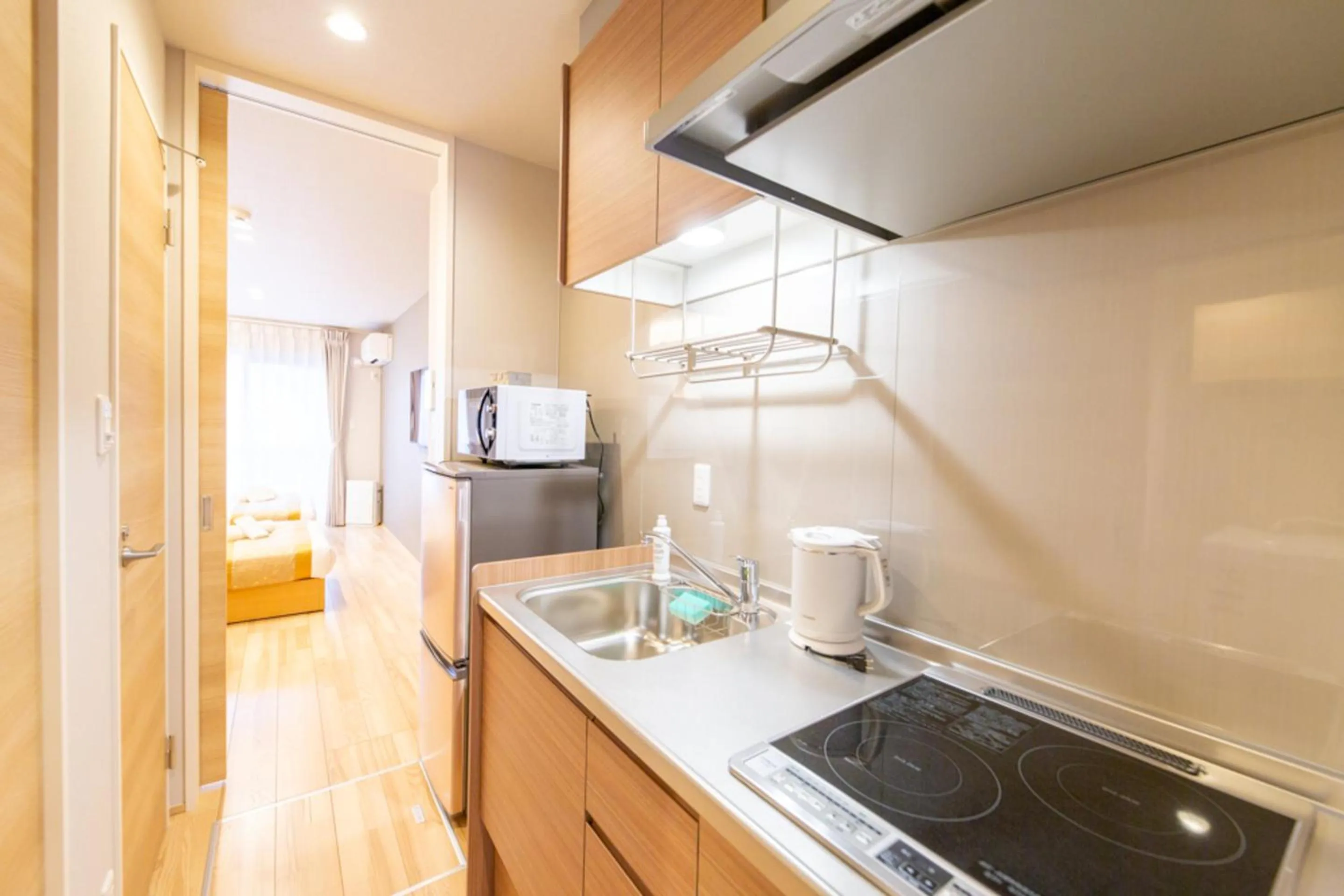 Kitchen or kitchenette in GRAND BASE Hiroshima Hikarimachi