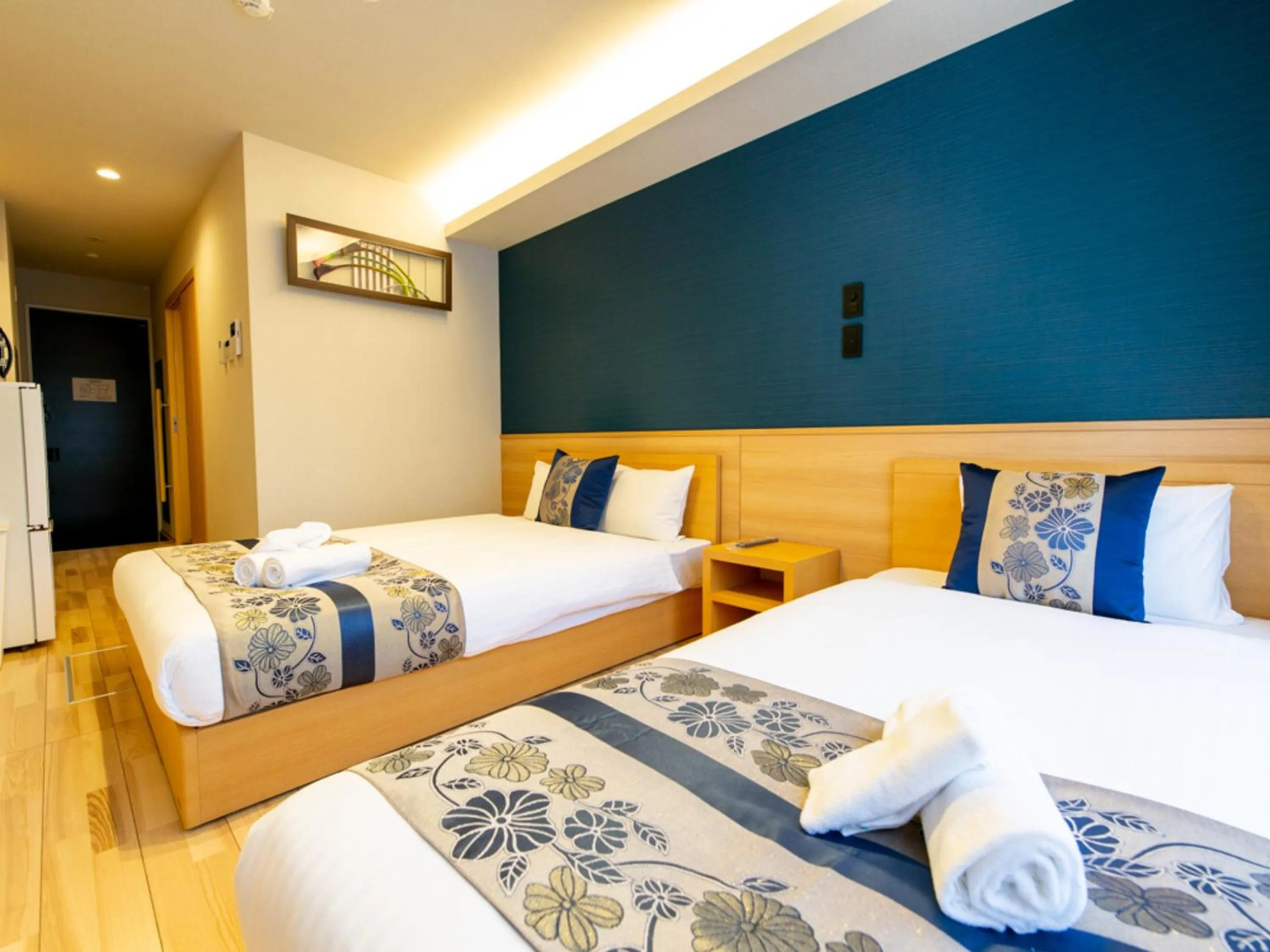 Photo of the whole room, Bed in GRAND BASE Hiroshima Hikarimachi