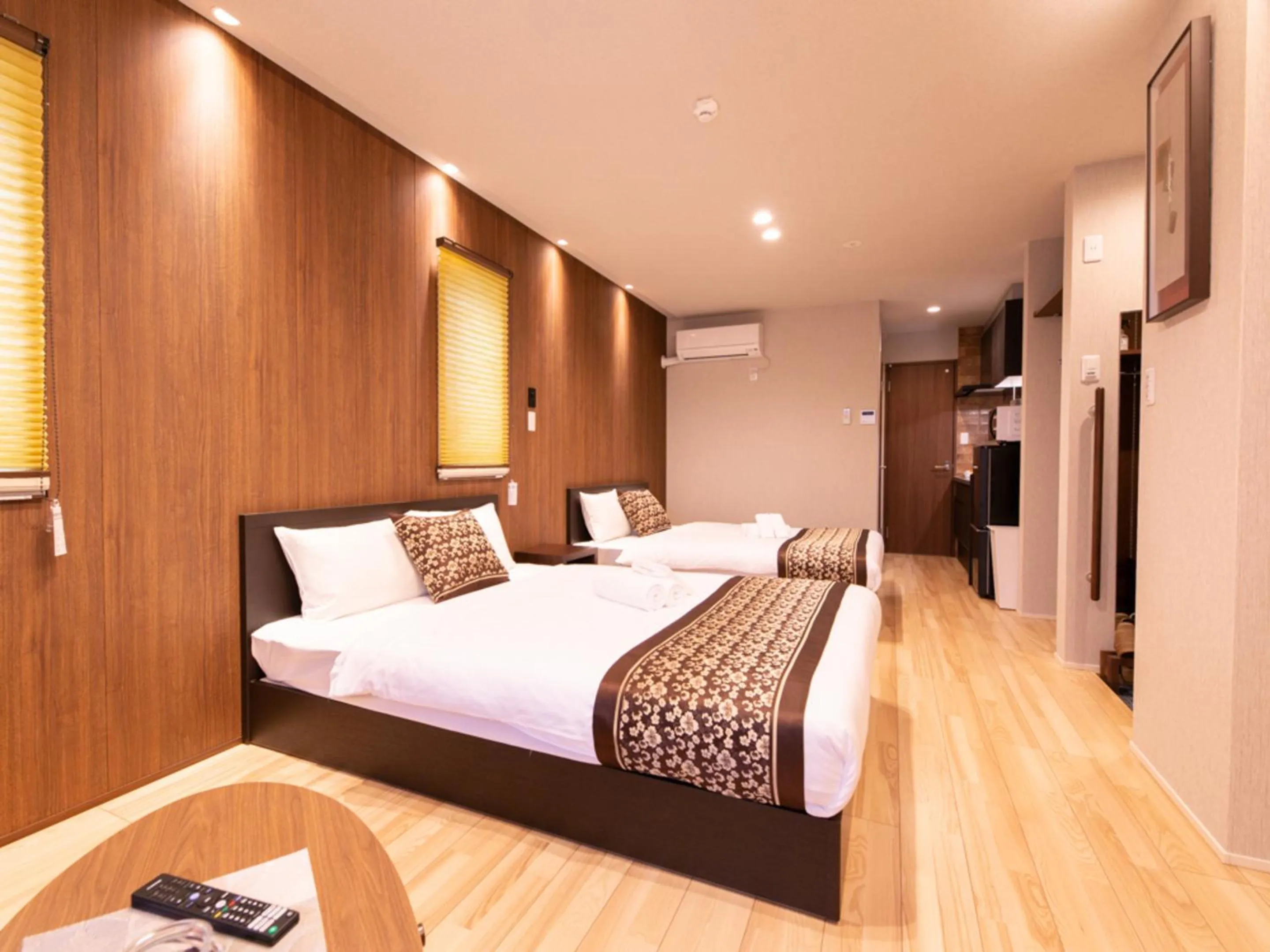 Bed in GRAND BASE Hiroshima Hikarimachi