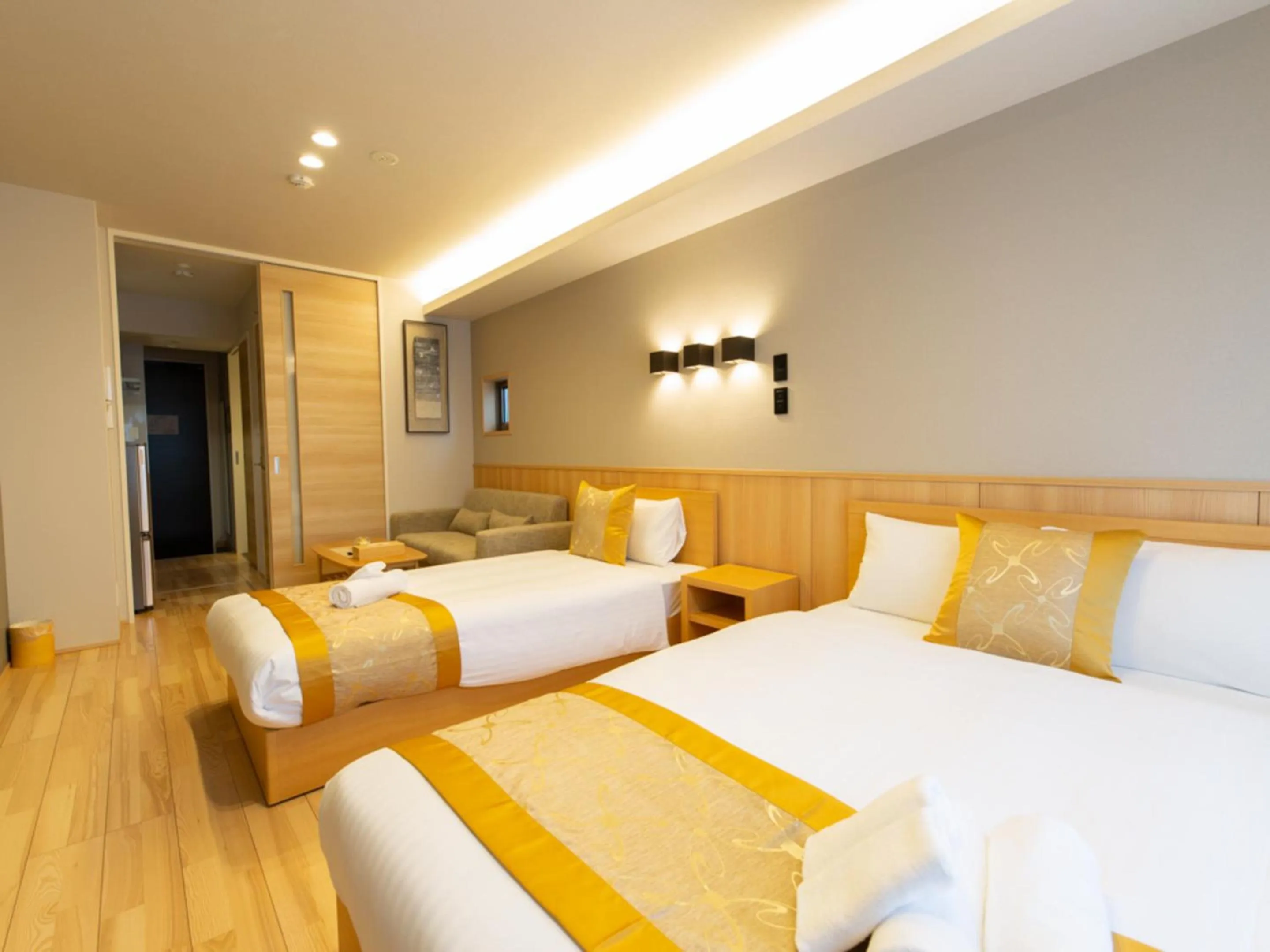 Photo of the whole room, Bed in GRAND BASE Hiroshima Hikarimachi