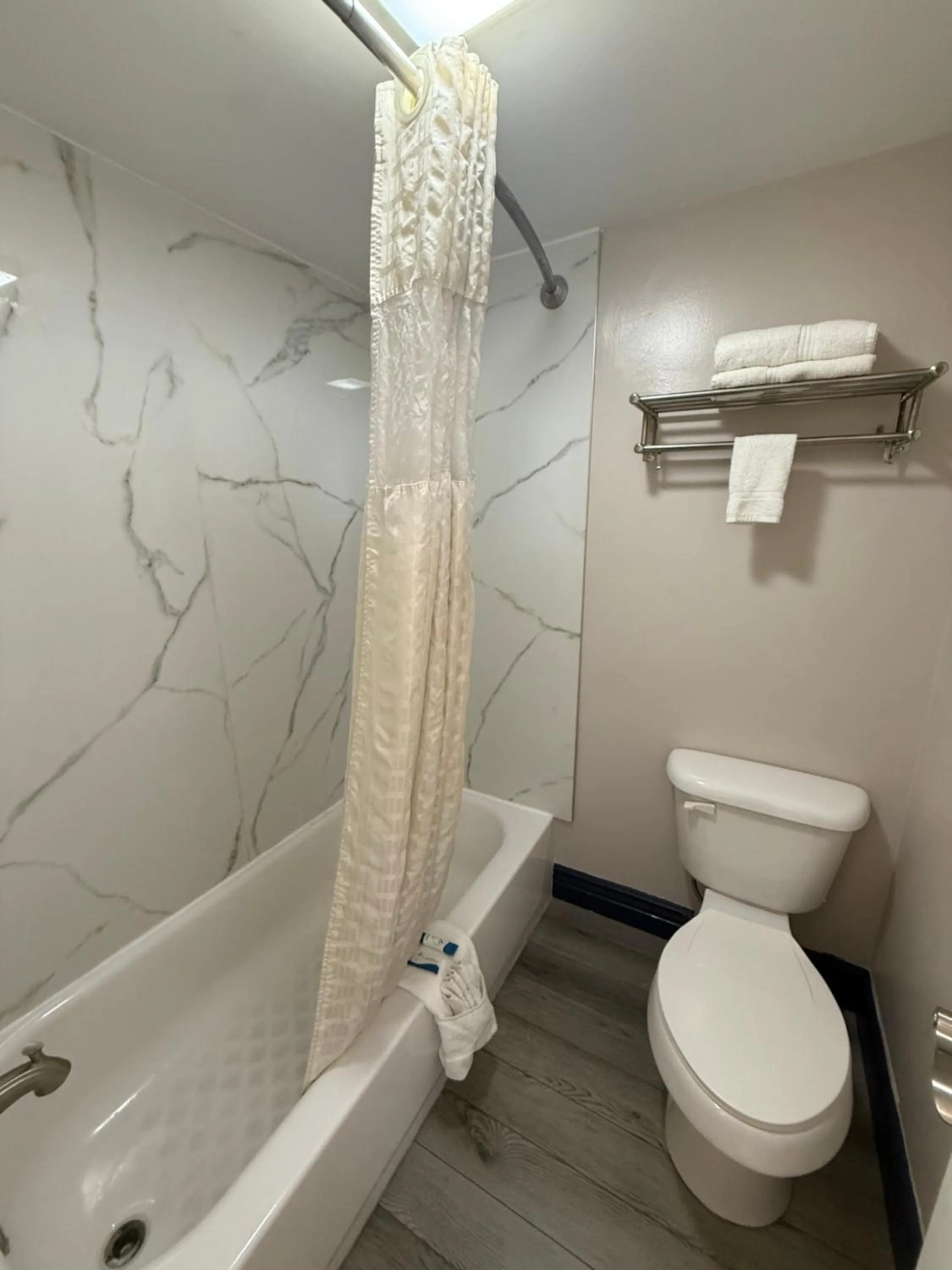 Toilet in Americas Best Value Inn Ponca City