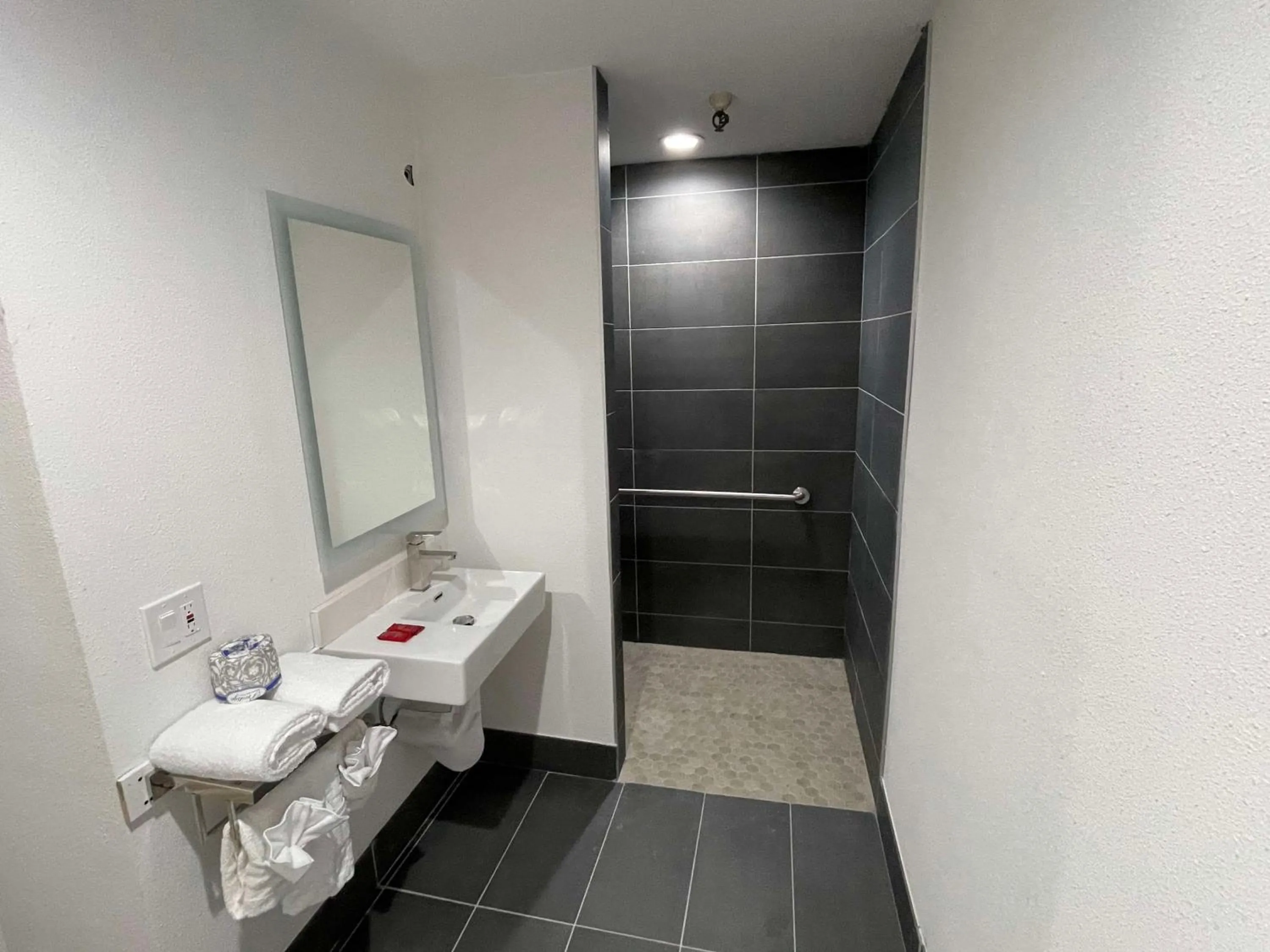 Bathroom in The Midtowner Hotel, SureStay Collection by Best Western
