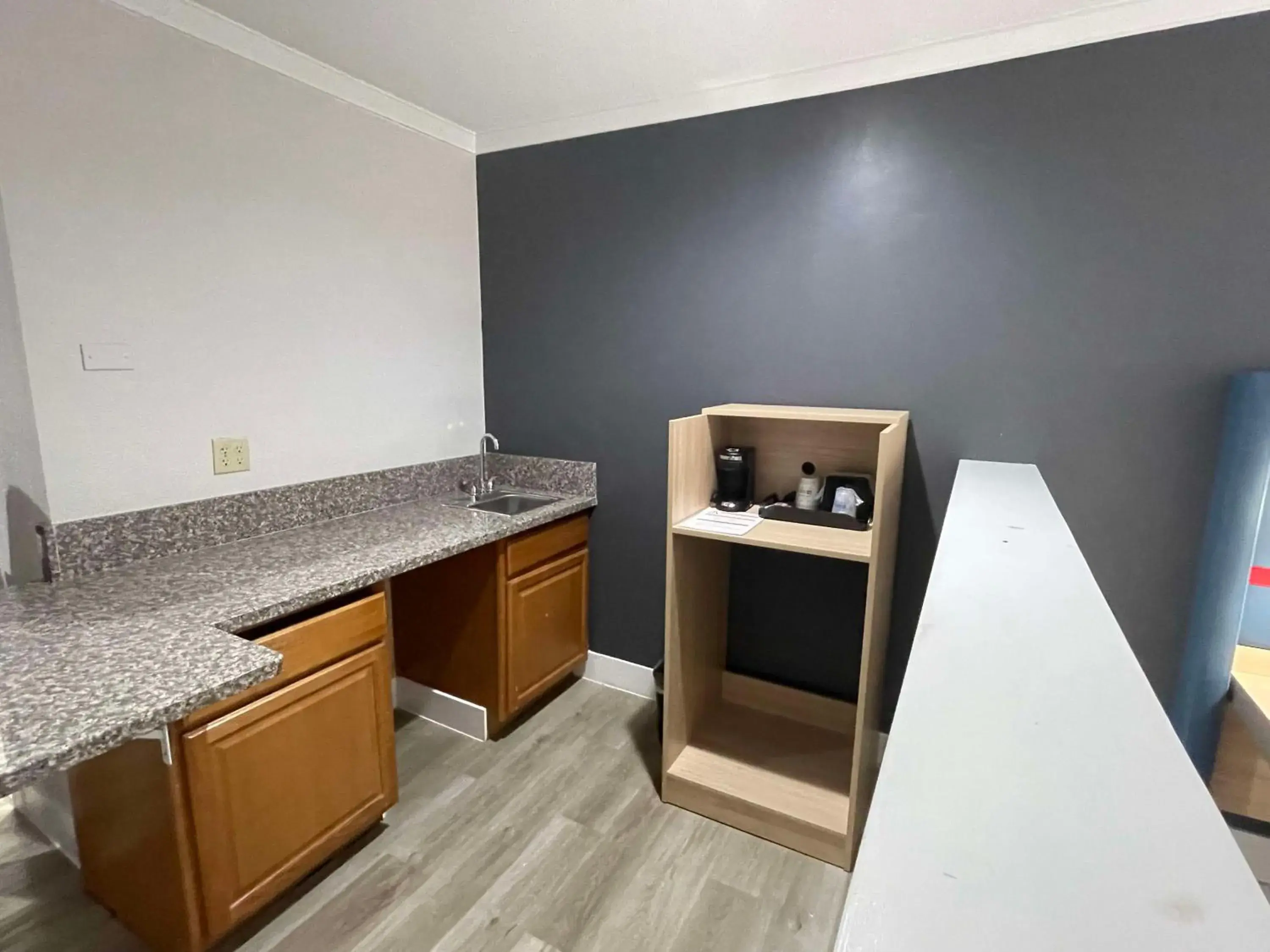 Bedroom in The Midtowner Hotel, SureStay Collection by Best Western Bedroom in The Midtowner Hotel, SureStay Collection by Best Western