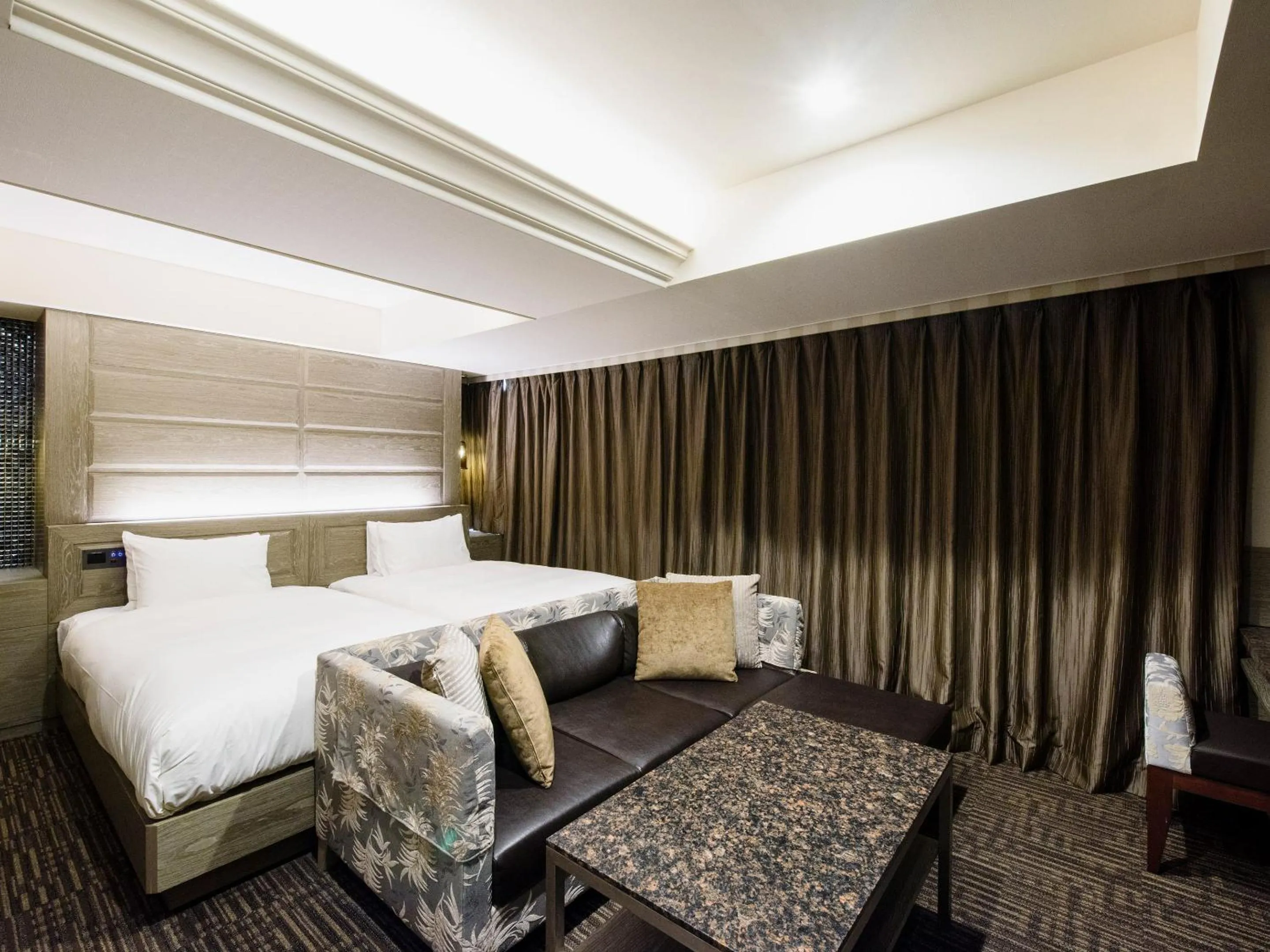 Bed in Meguroholic Hotel