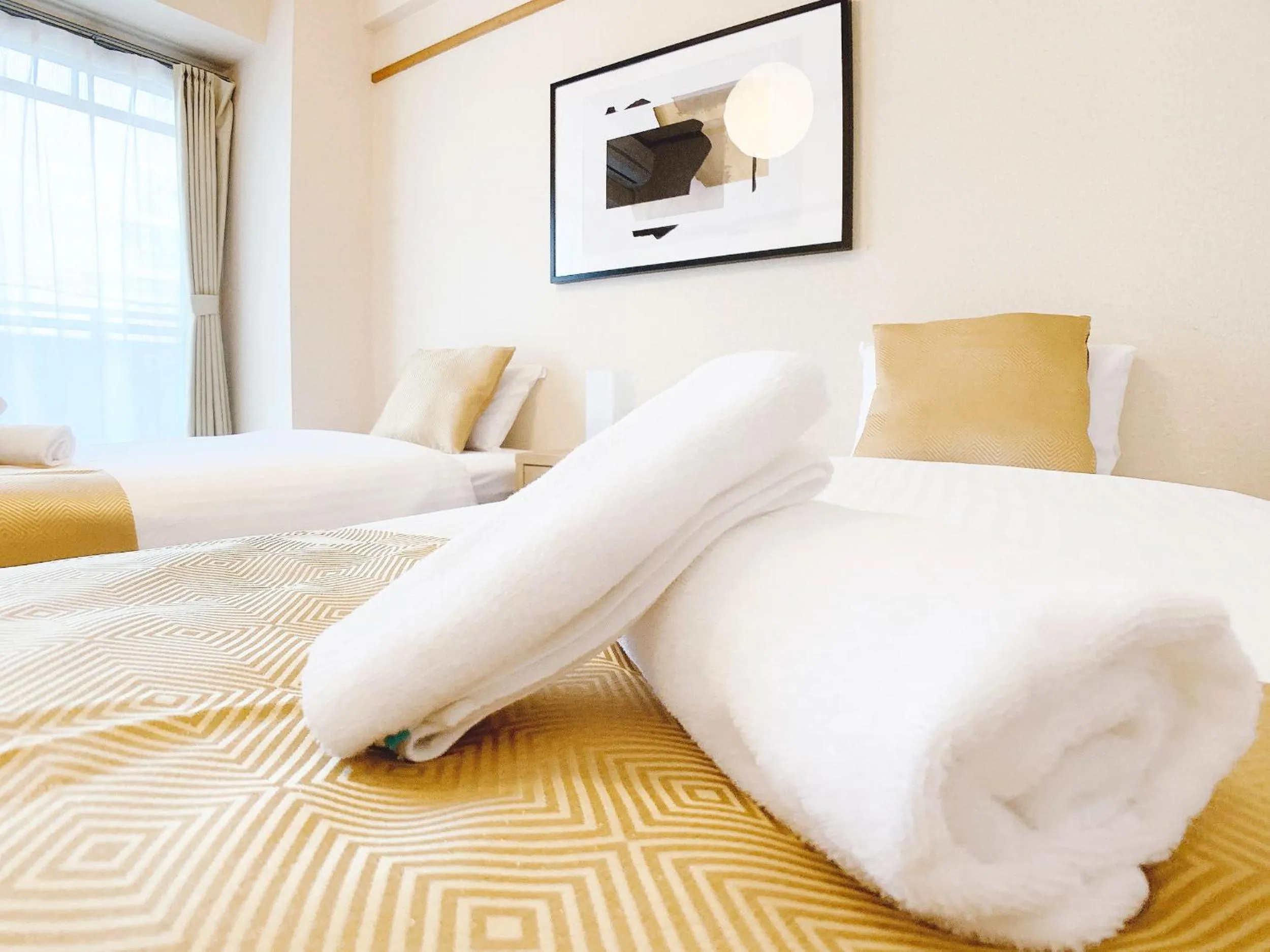 Bed in OUCHI HOTEL Dambara