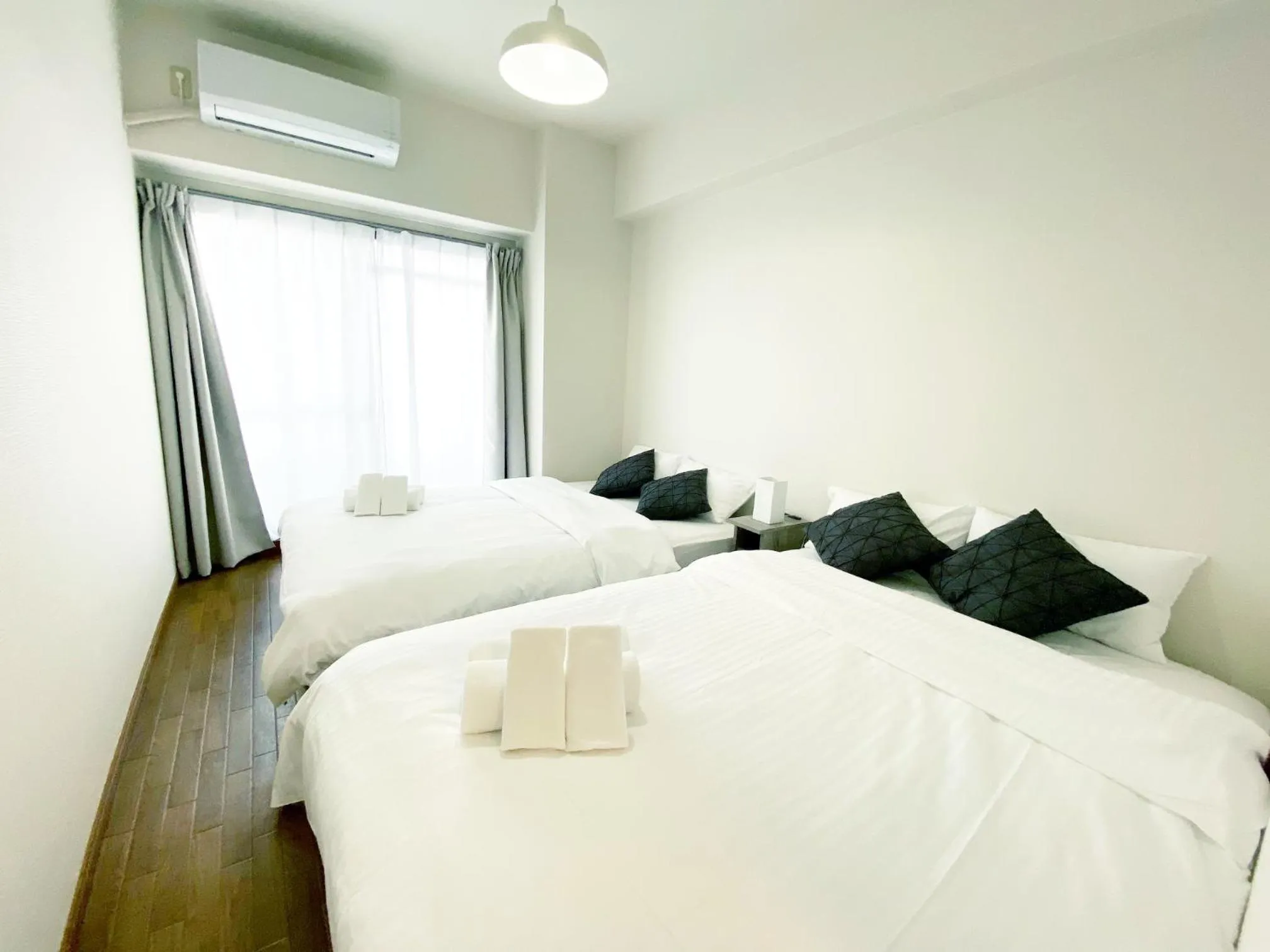 Bed in OUCHI HOTEL Dambara