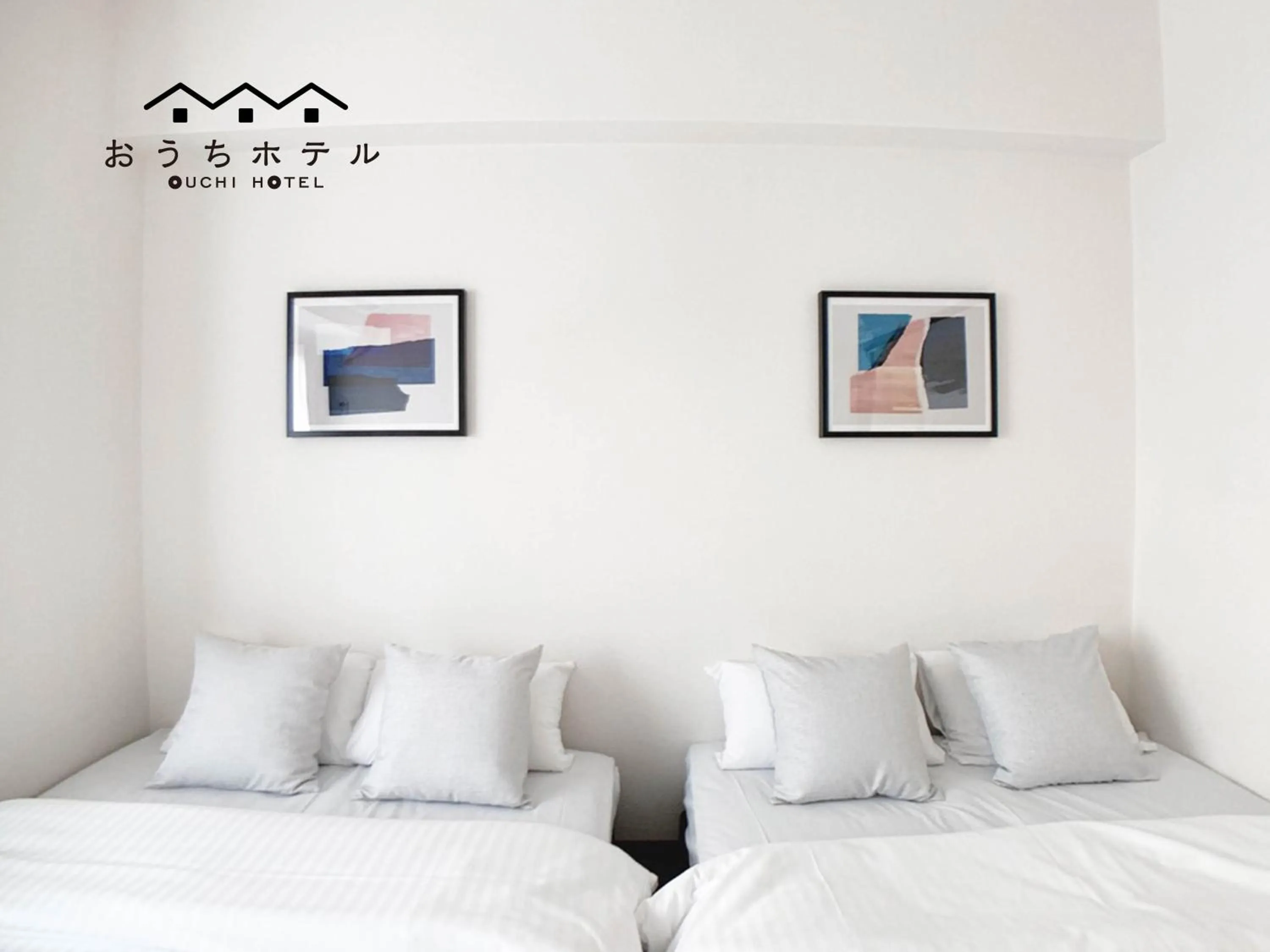 Bed in OUCHI HOTEL Dambara