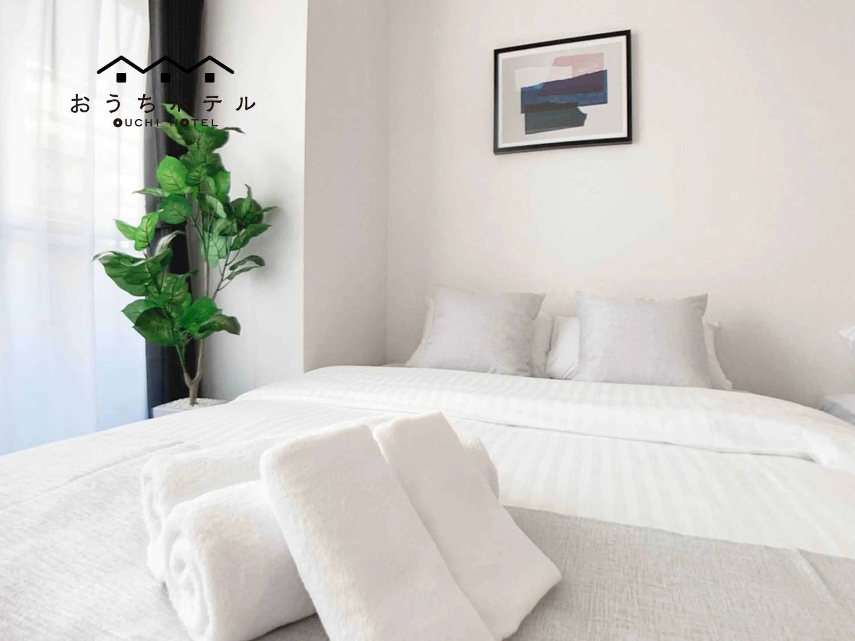 Bed in OUCHI HOTEL Dambara