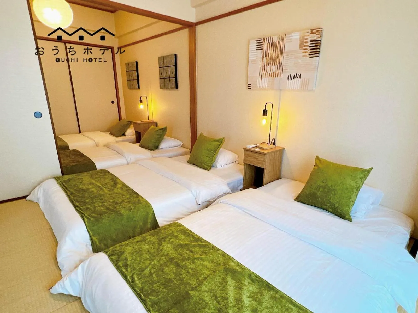 Bed in OUCHI HOTEL Dambara