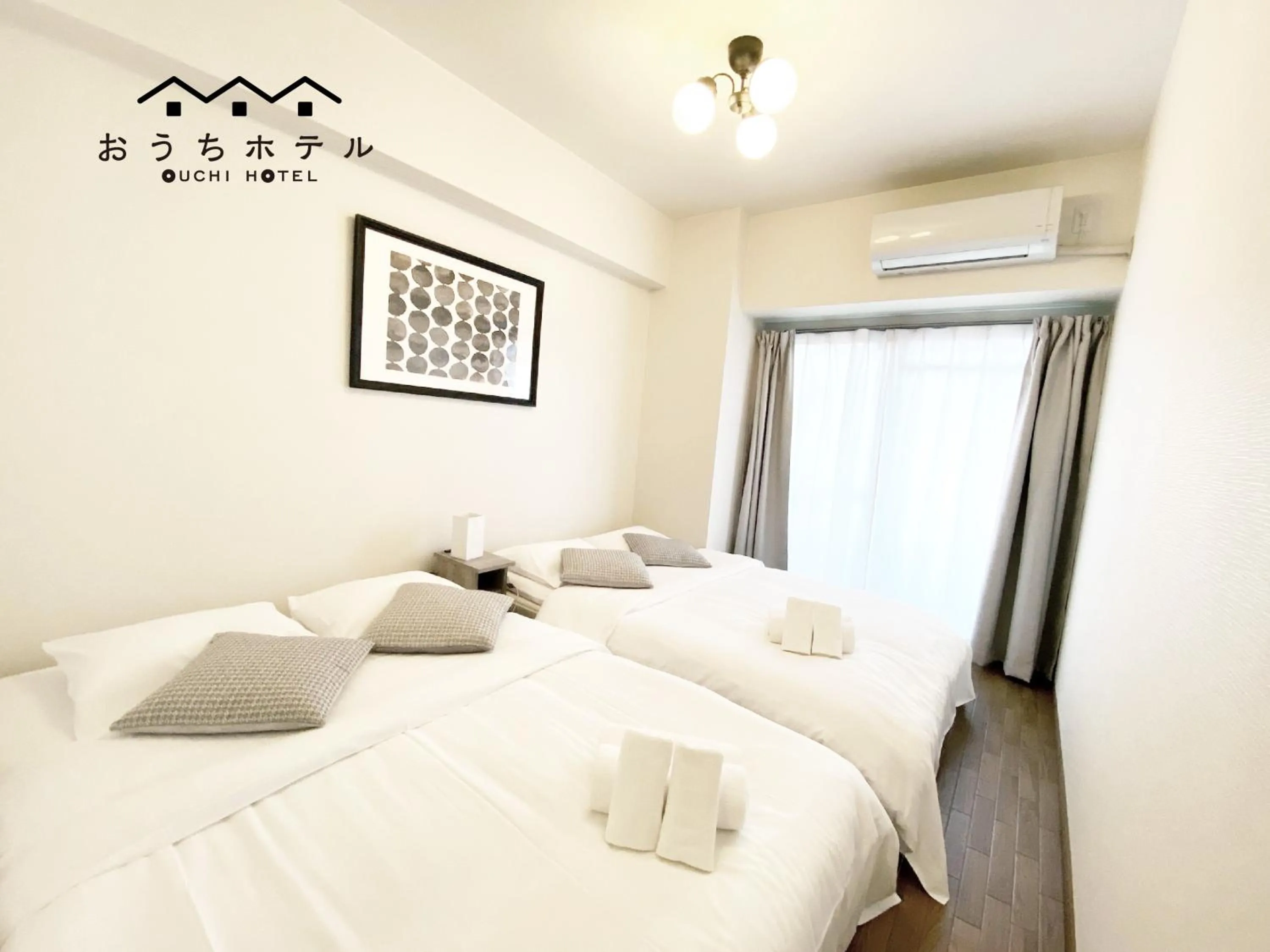 Bed in OUCHI HOTEL Dambara