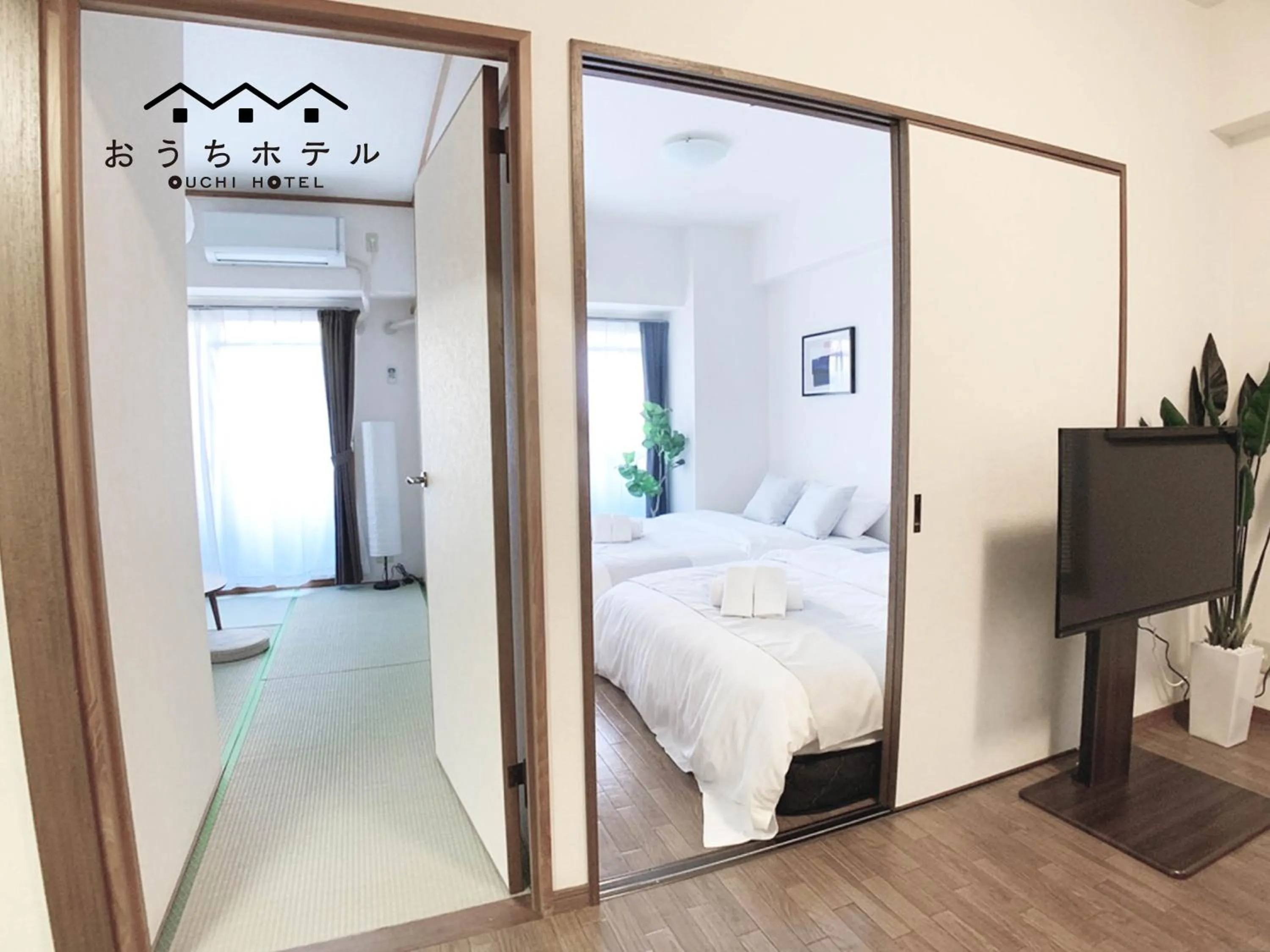 Bed in OUCHI HOTEL Dambara