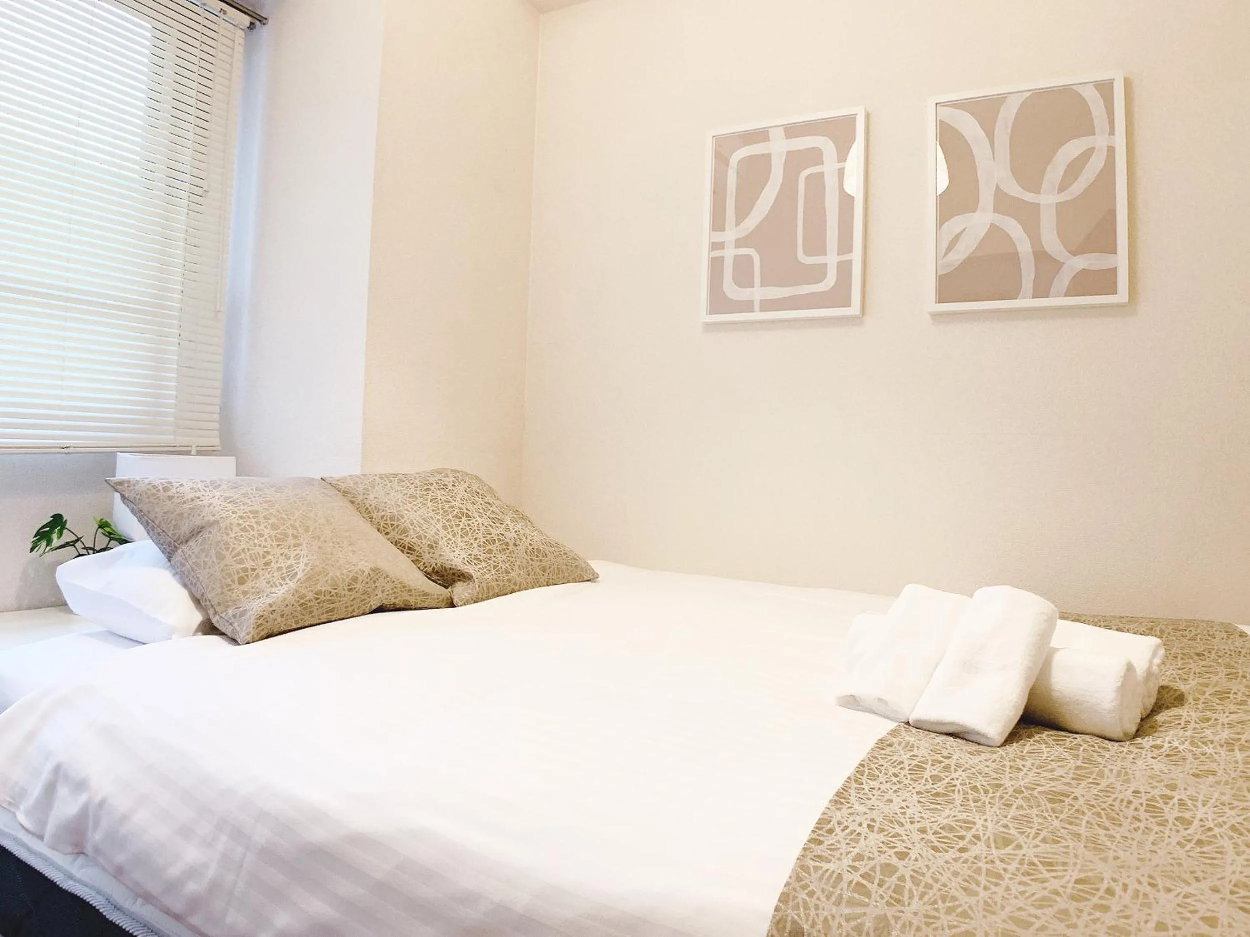 Bed in OUCHI HOTEL Dambara