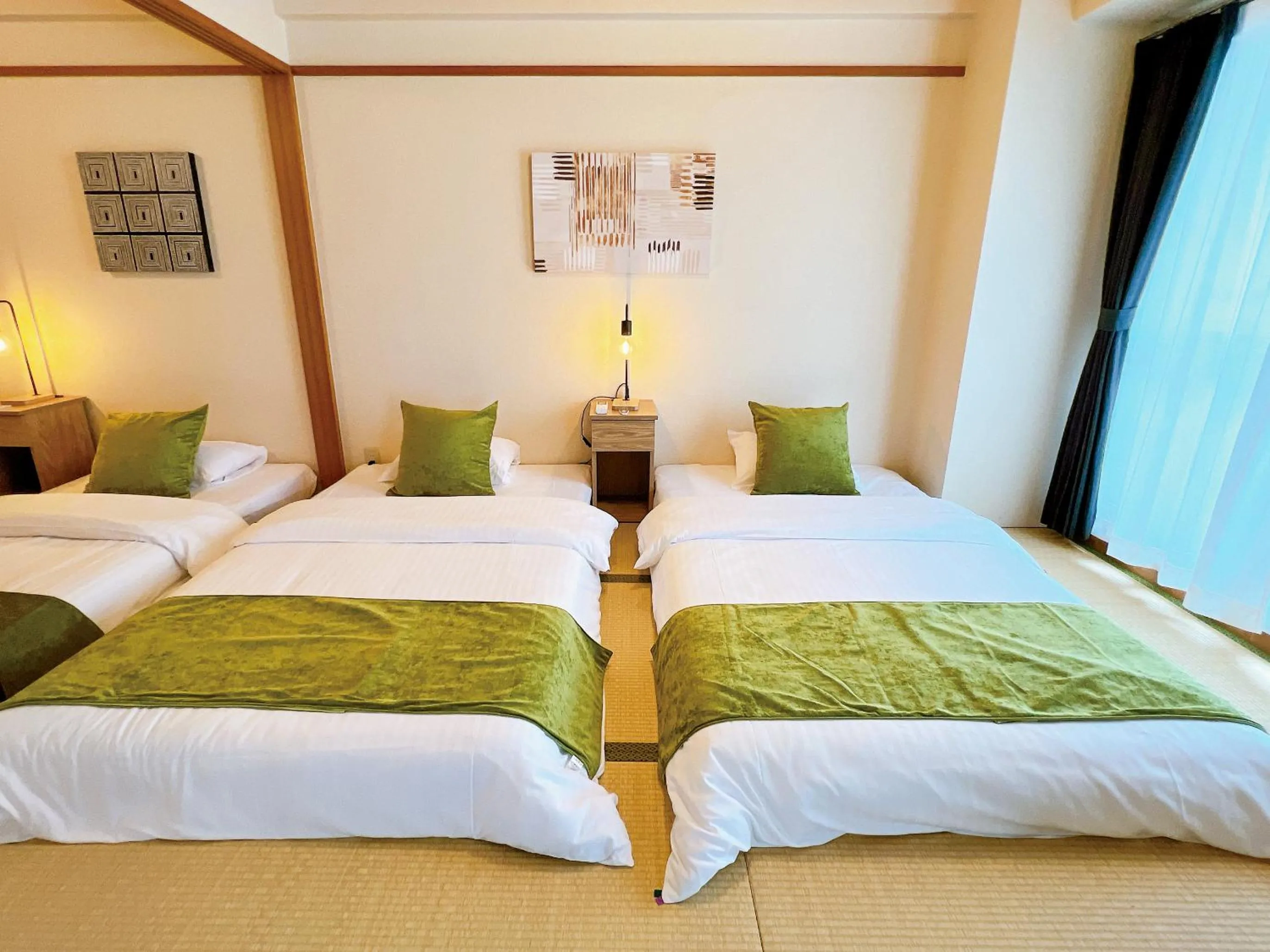 Bed in OUCHI HOTEL Dambara