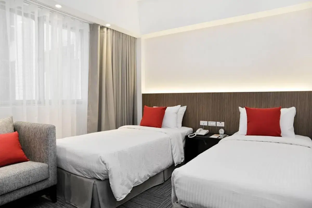 Deluxe Twin Room (B) in Emperor Hotel Deluxe Twin Room (B) in Emperor Hotel