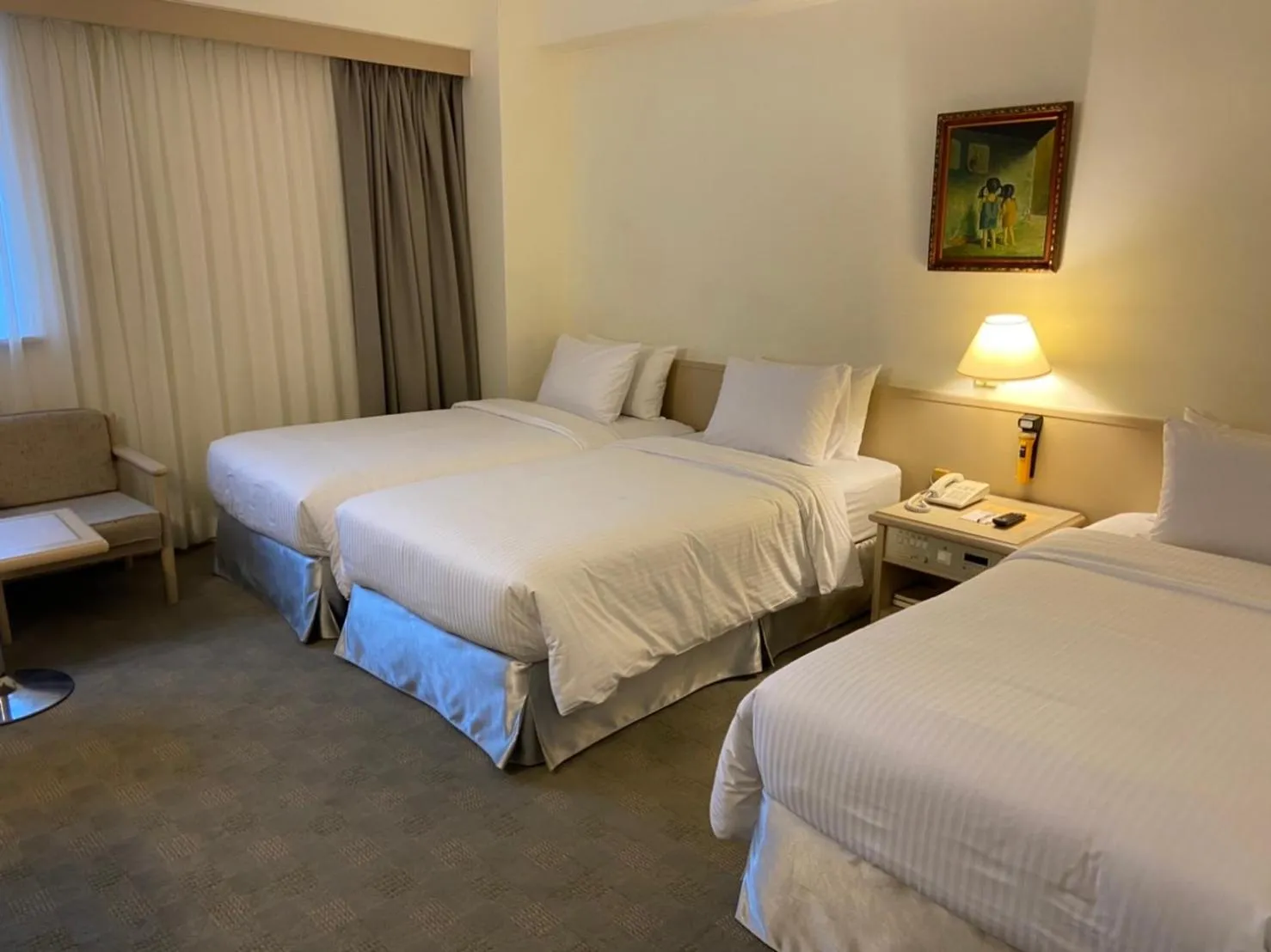 Bed in Emperor Hotel