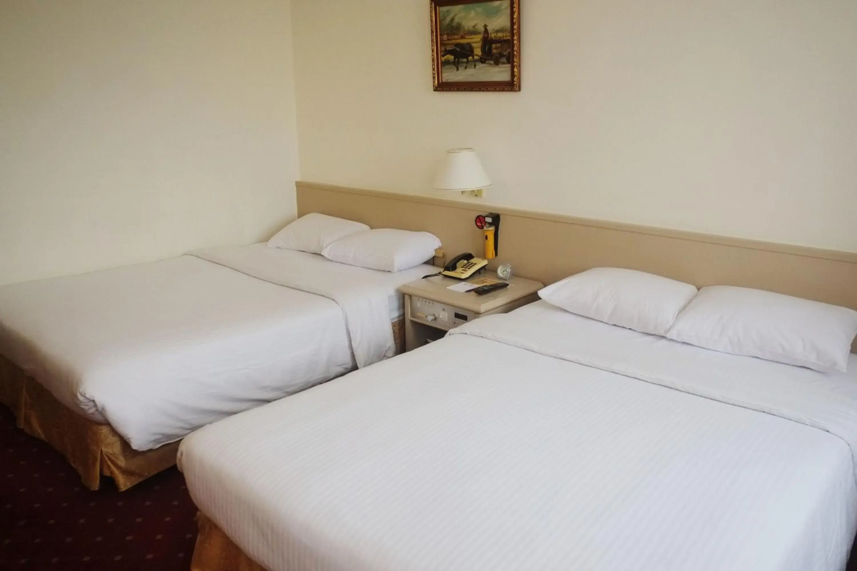 Bed in Emperor Hotel Bed in Emperor Hotel