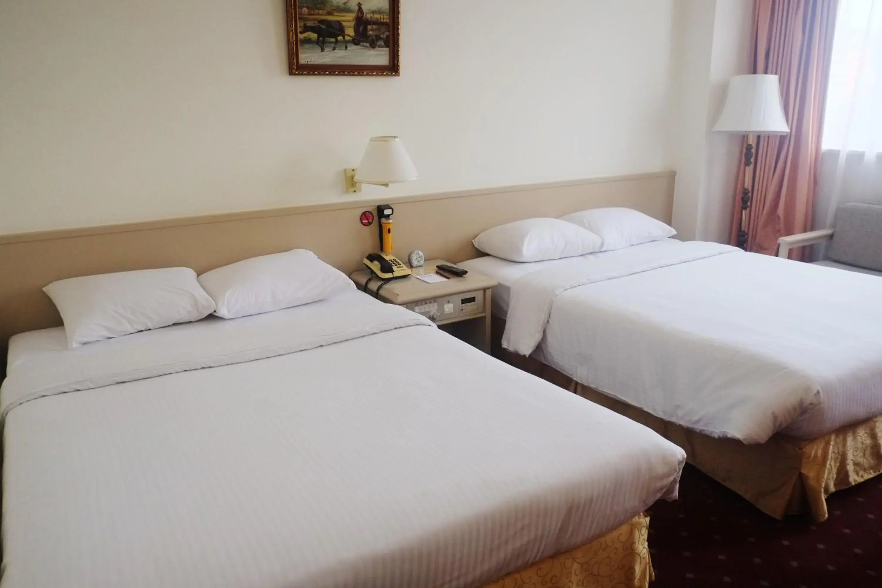 Quadruple Room in Emperor Hotel Quadruple Room in Emperor Hotel