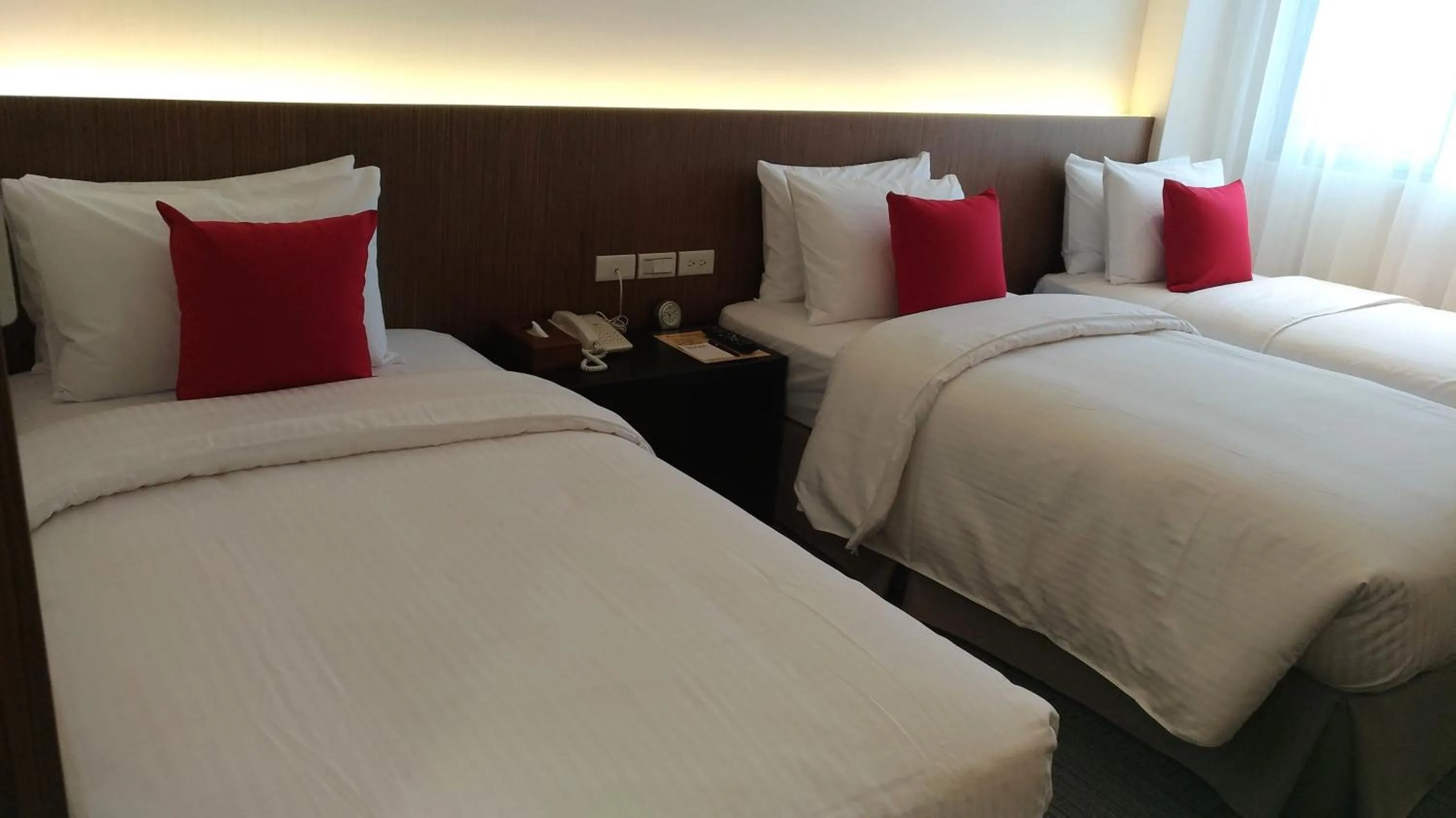 Bed in Emperor Hotel