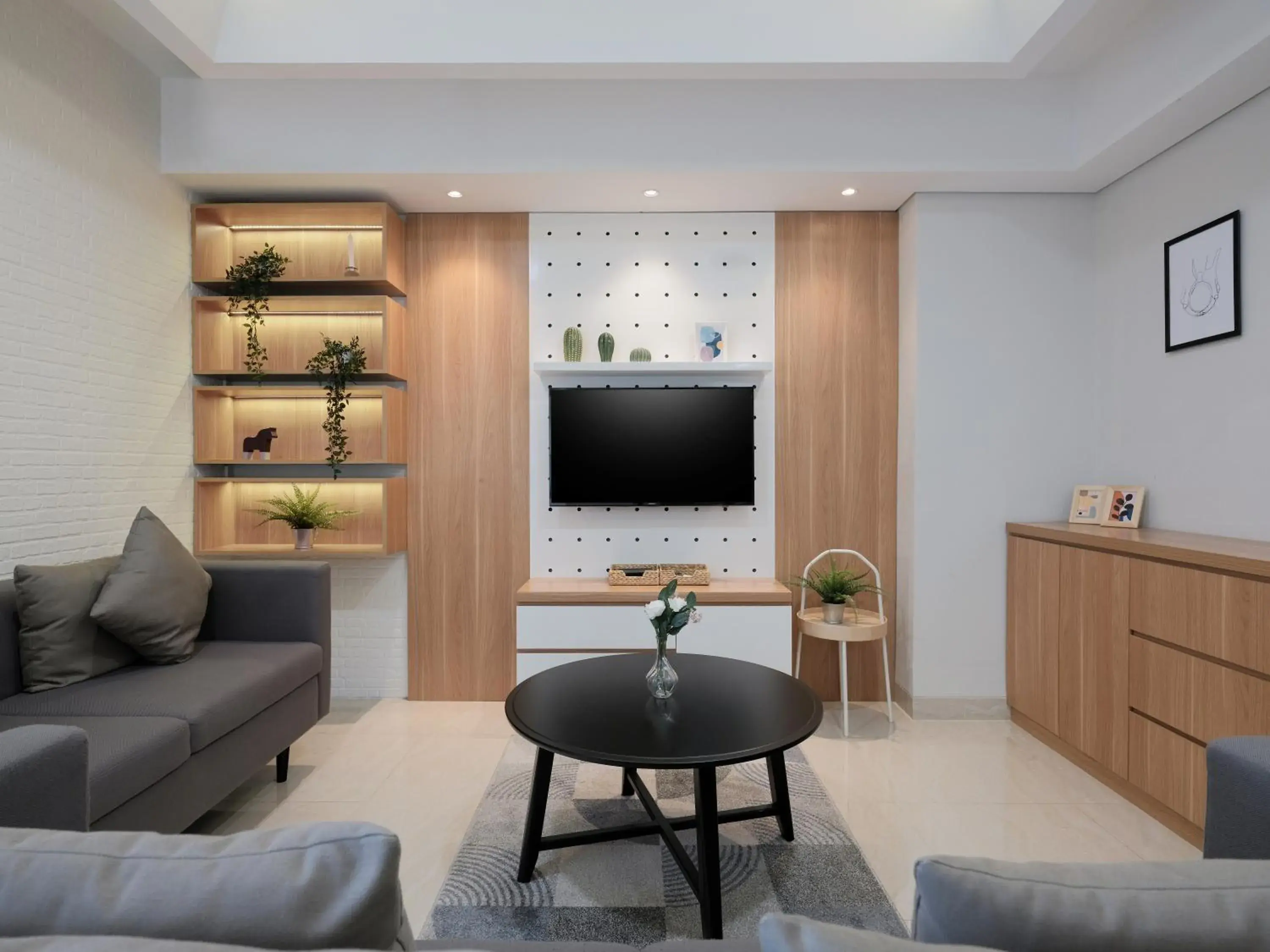 Living room in Fika Rooms Tangerang By Skandinavia Living room in Fika Rooms Tangerang By Skandinavia