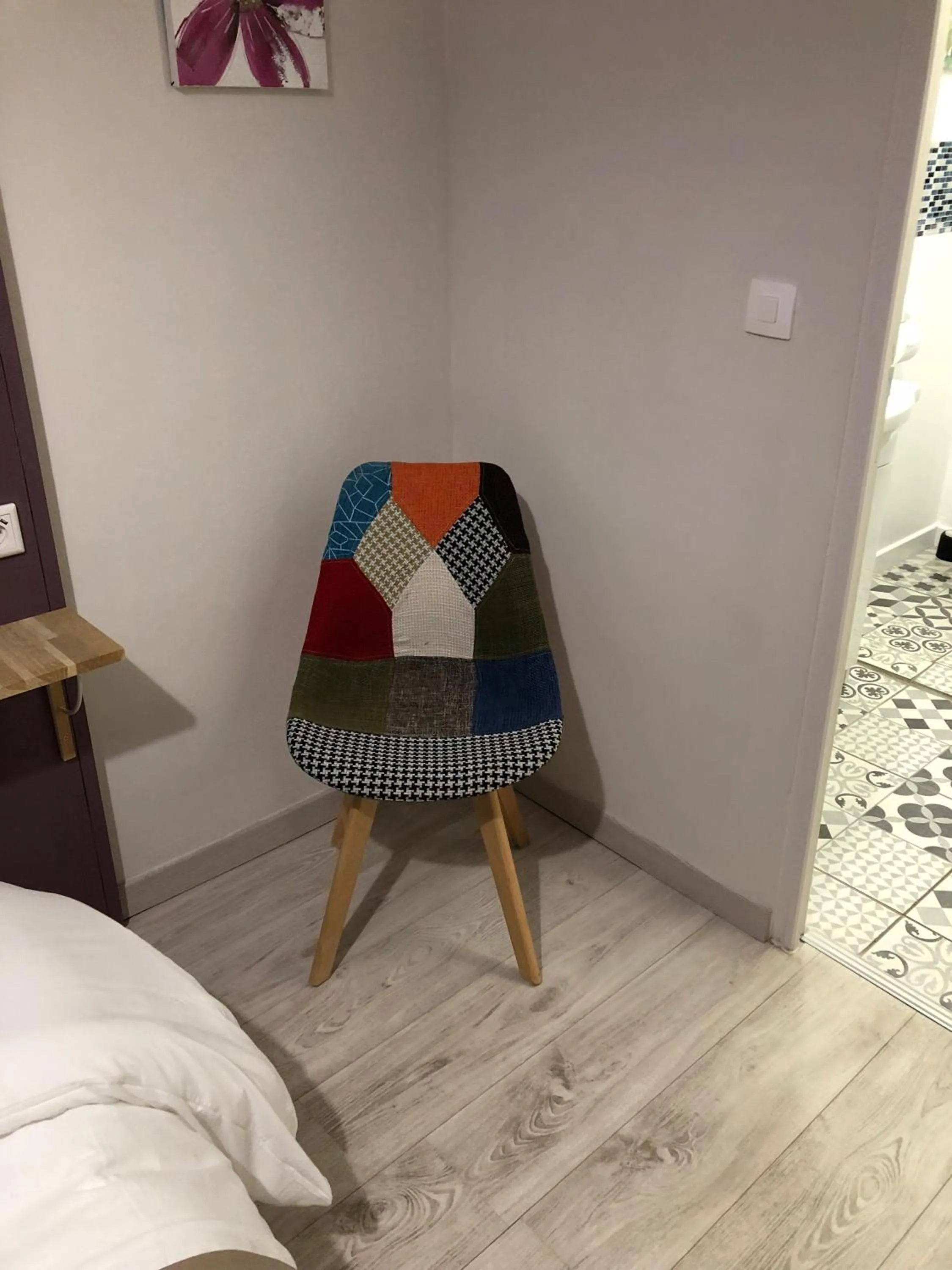 Seating area in Logis Hôtel Restaurant Les Aubuns