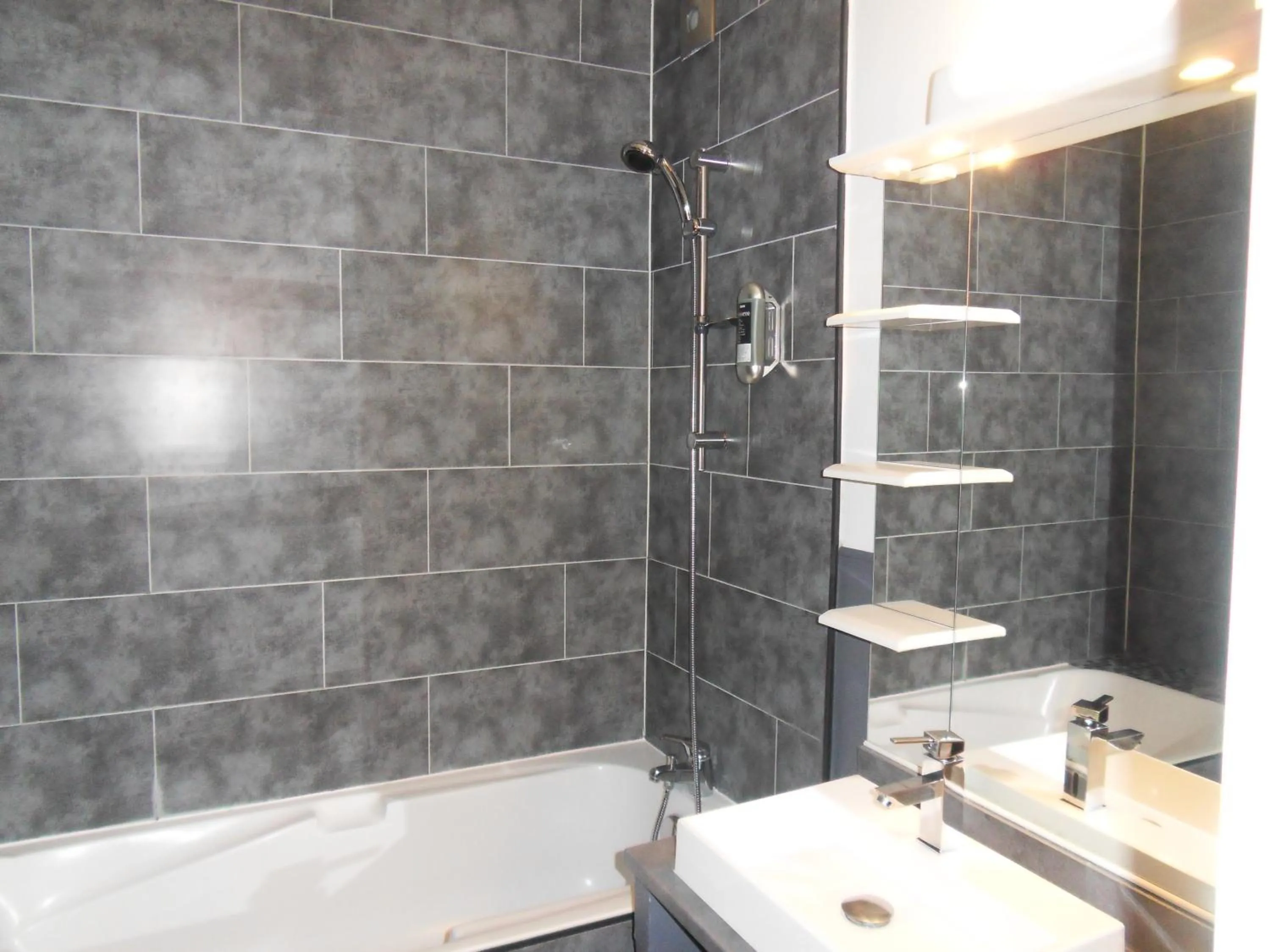 Bathroom in Logis Hôtel Restaurant Les Aubuns