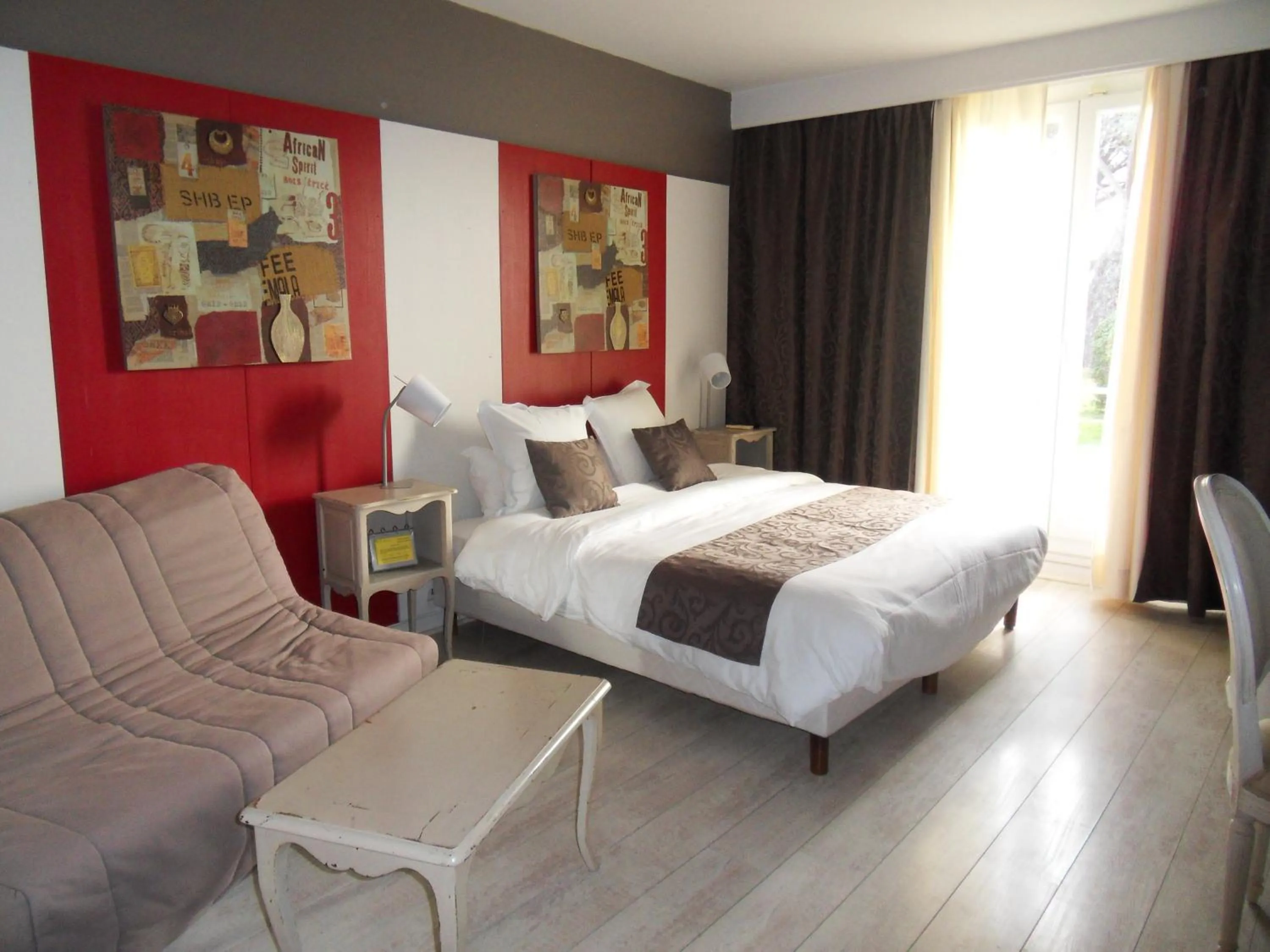 Photo of the whole room, Bed in Logis Hôtel Restaurant Les Aubuns