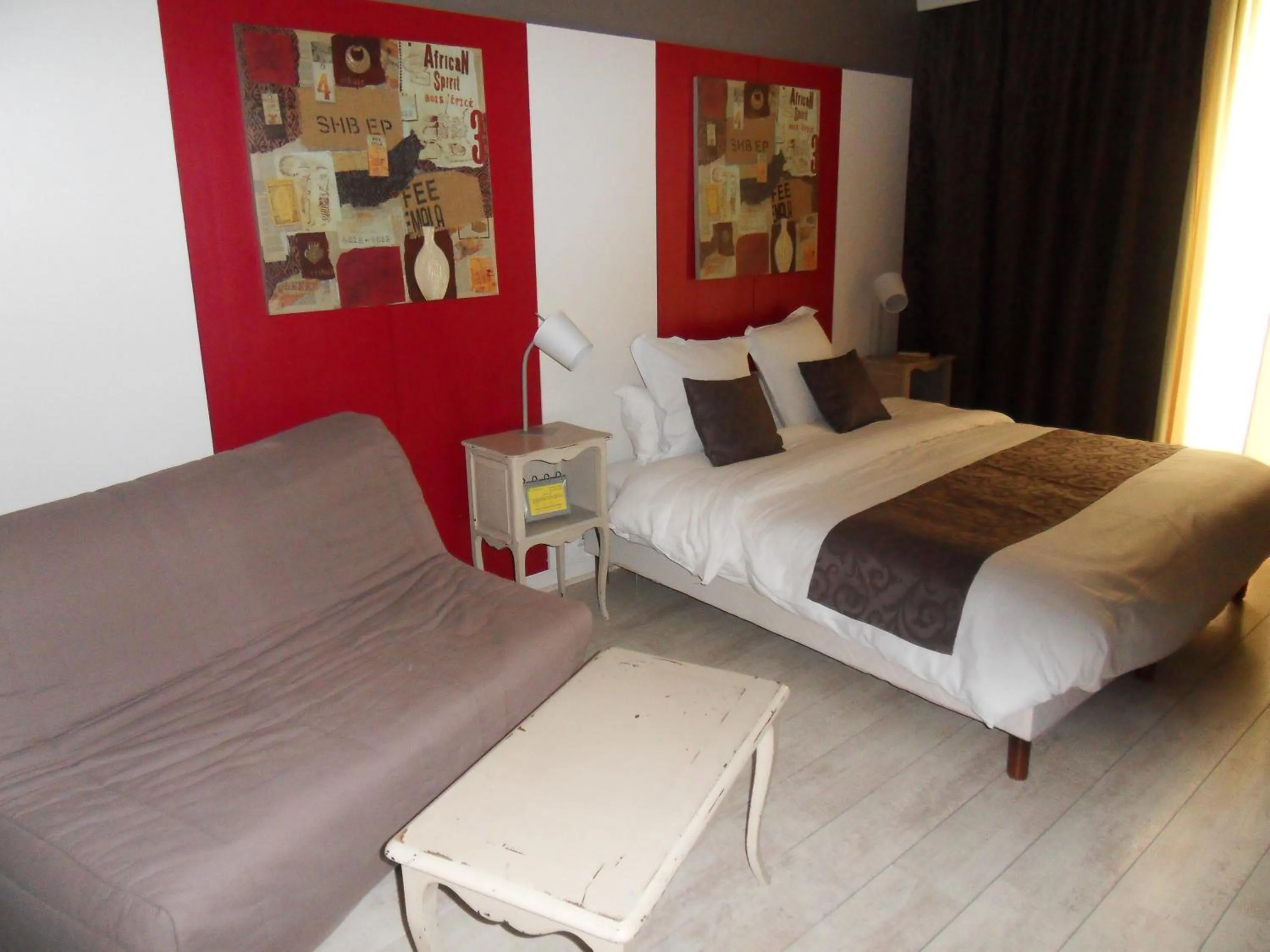 Photo of the whole room, Bed in Logis Hôtel Restaurant Les Aubuns