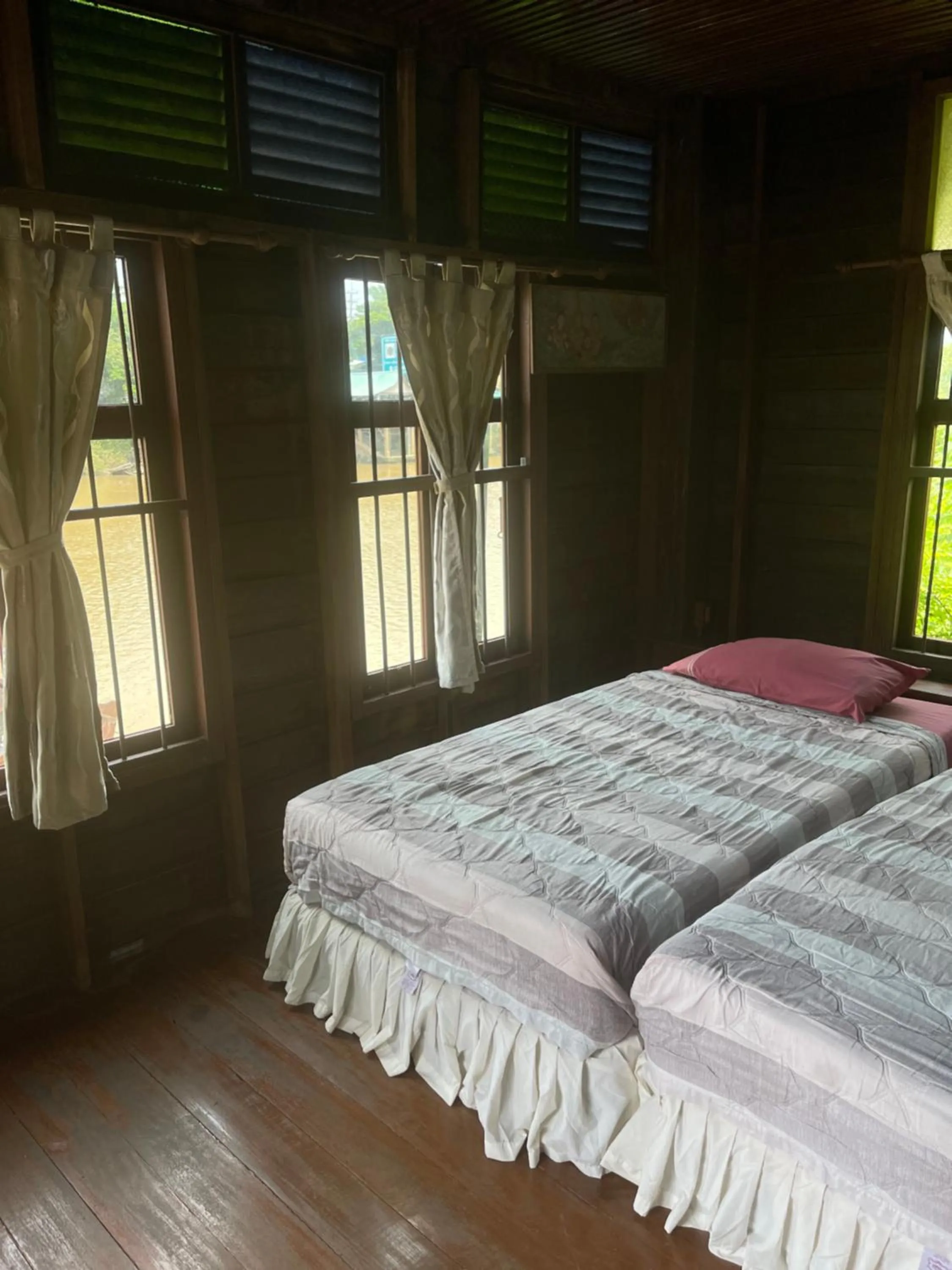 Bed in Ayothaya Riverside House