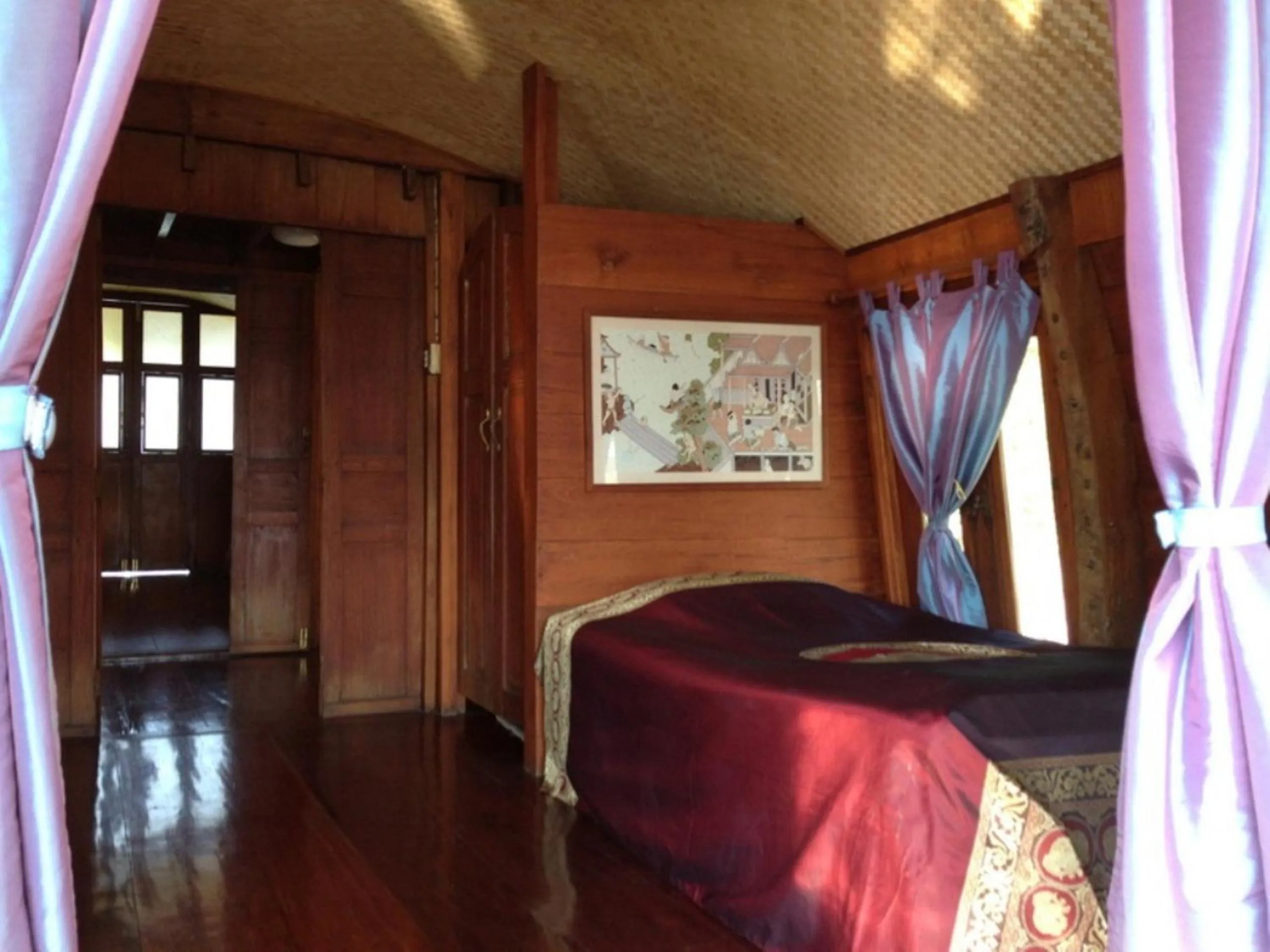 Bed in Ayothaya Riverside House