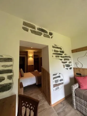 Bed in Edelweiss Hotel Champoluc