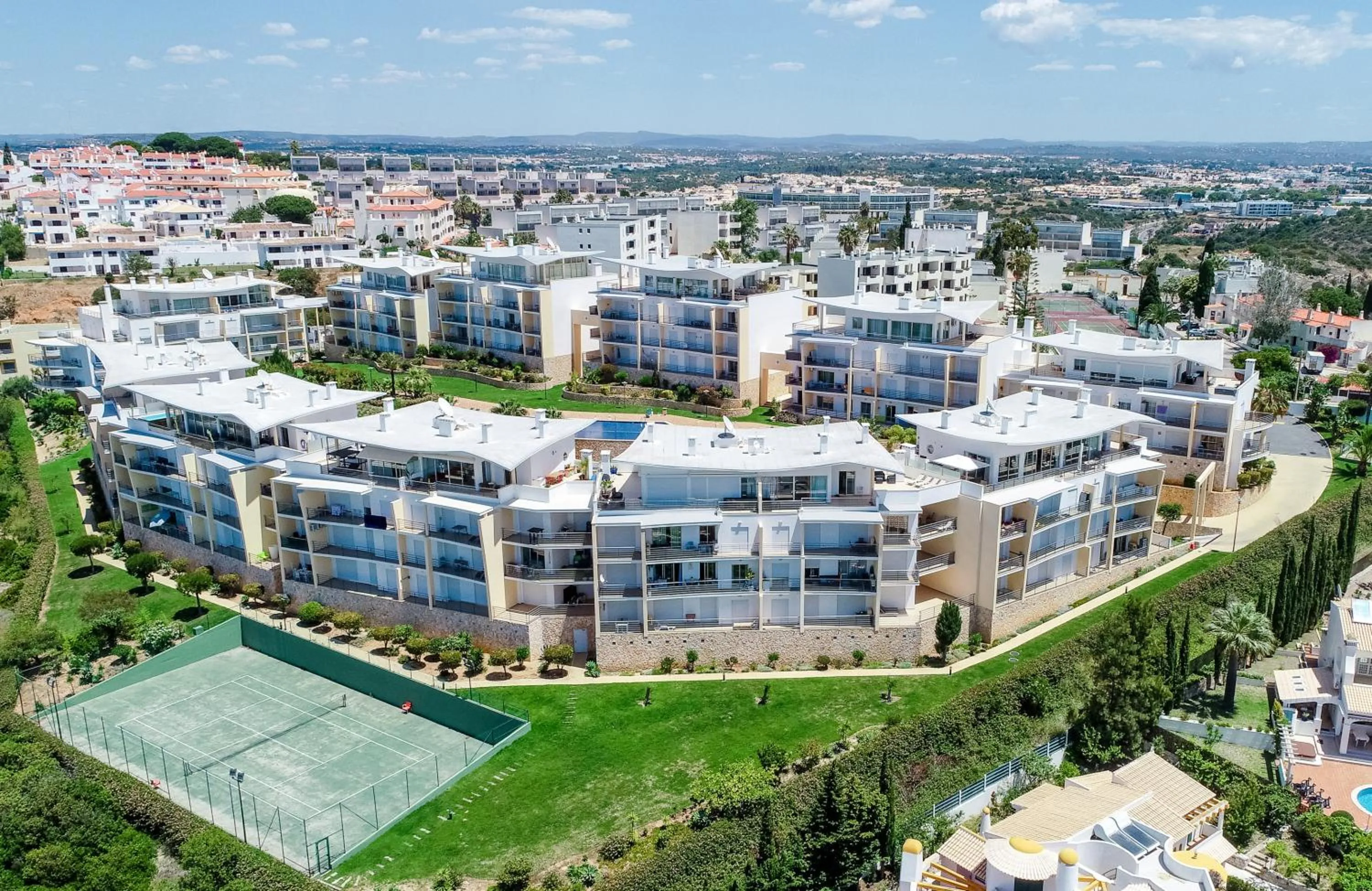 Bird's eye view in BnB Homes Ocean view Apartment with 3 spacious Terraces, 2 Swimming pools & Tennis court