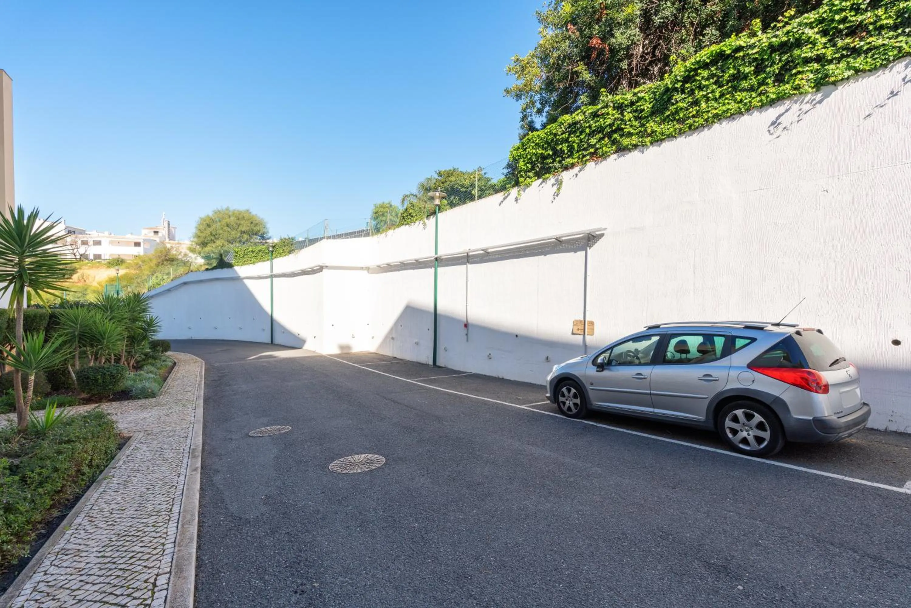 Parking in BnB Homes Ocean view Apartment with 3 spacious Terraces, 2 Swimming pools & Tennis court