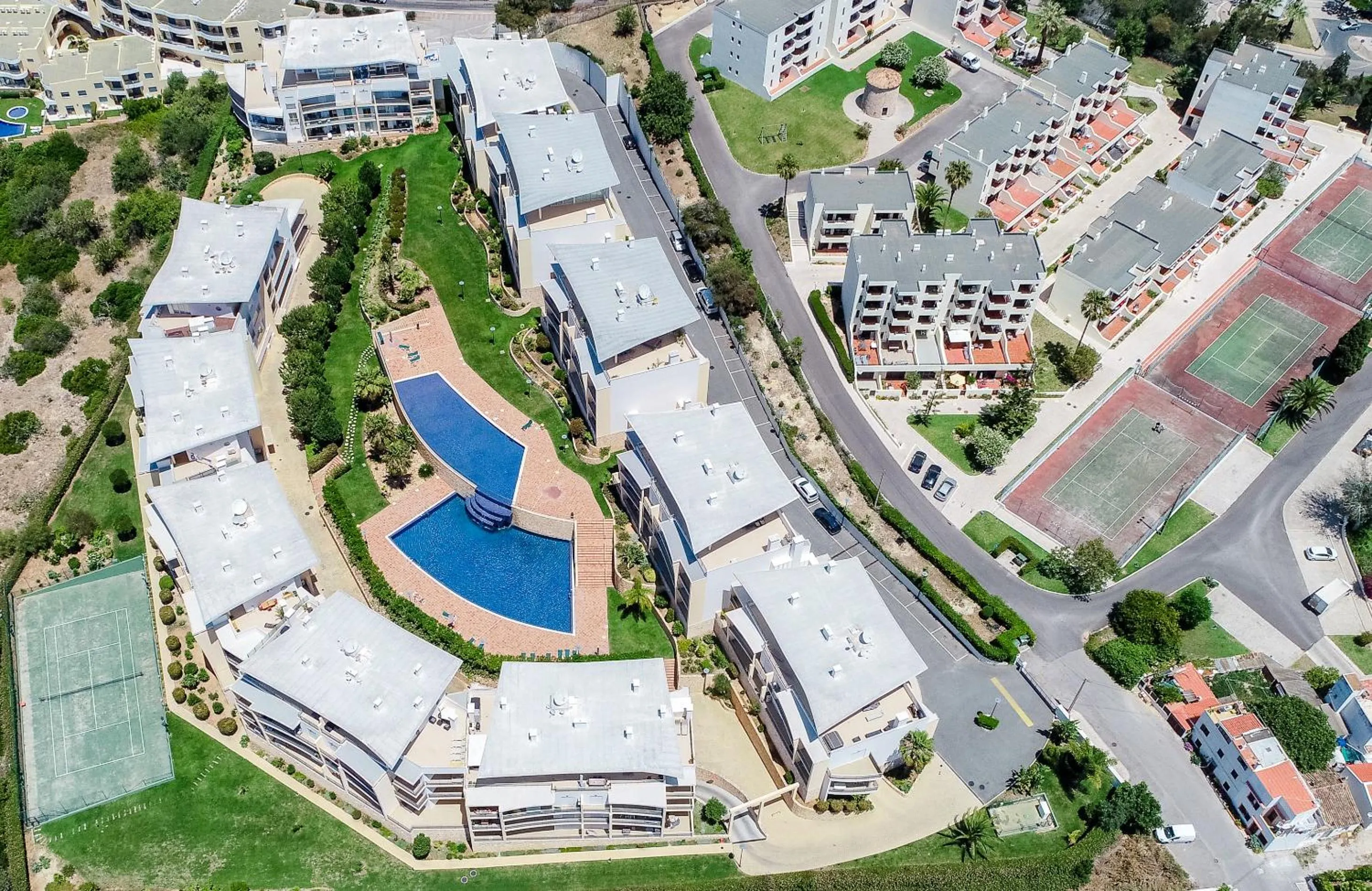 Bird's eye view in BnB Homes Ocean view Apartment with 3 spacious Terraces, 2 Swimming pools & Tennis court
