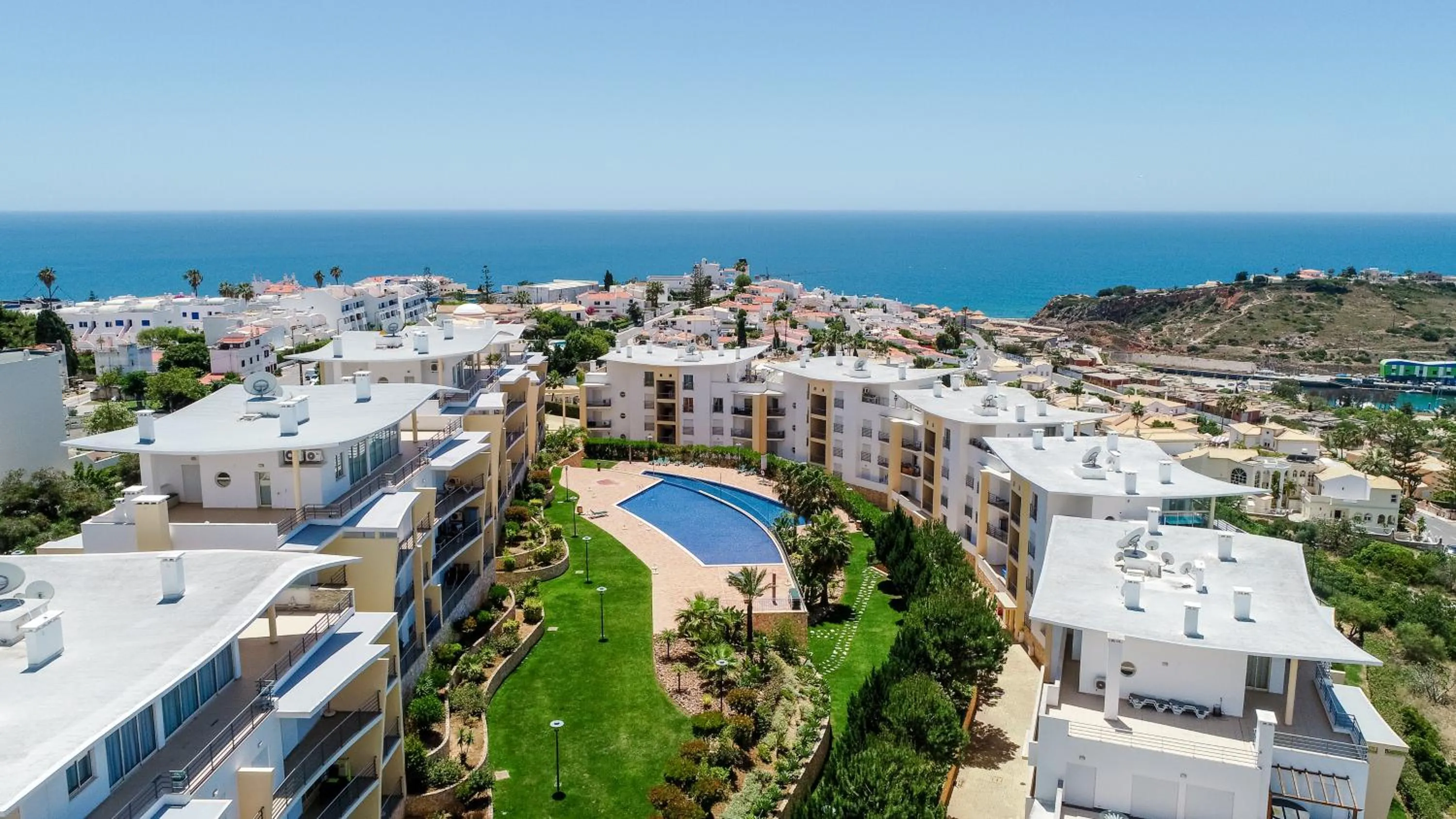 Bird's eye view in BnB Homes Ocean view Apartment with 3 spacious Terraces, 2 Swimming pools & Tennis court