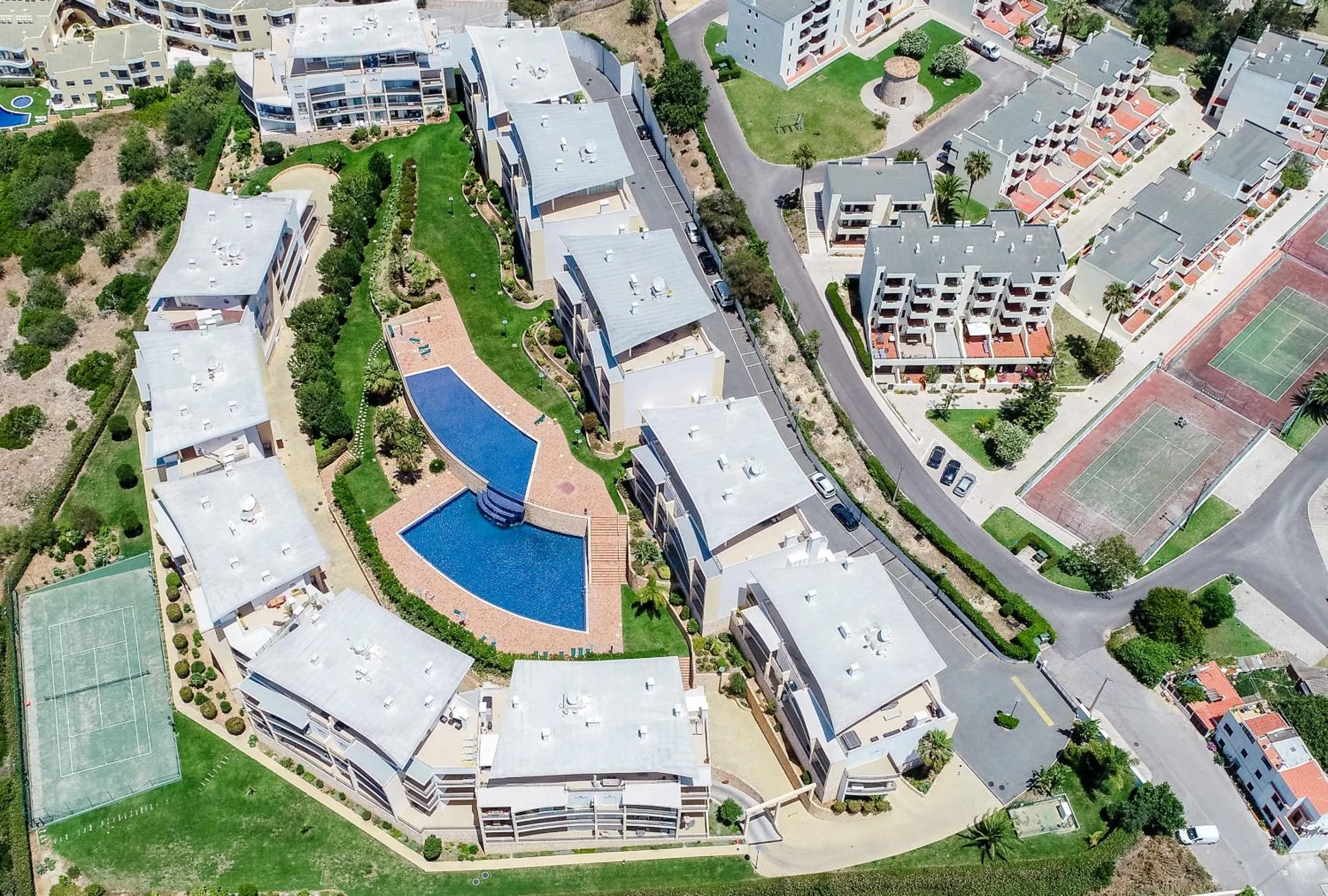 Bird's eye view in BnB Homes Ocean view Apartment with 3 spacious Terraces, 2 Swimming pools & Tennis court
