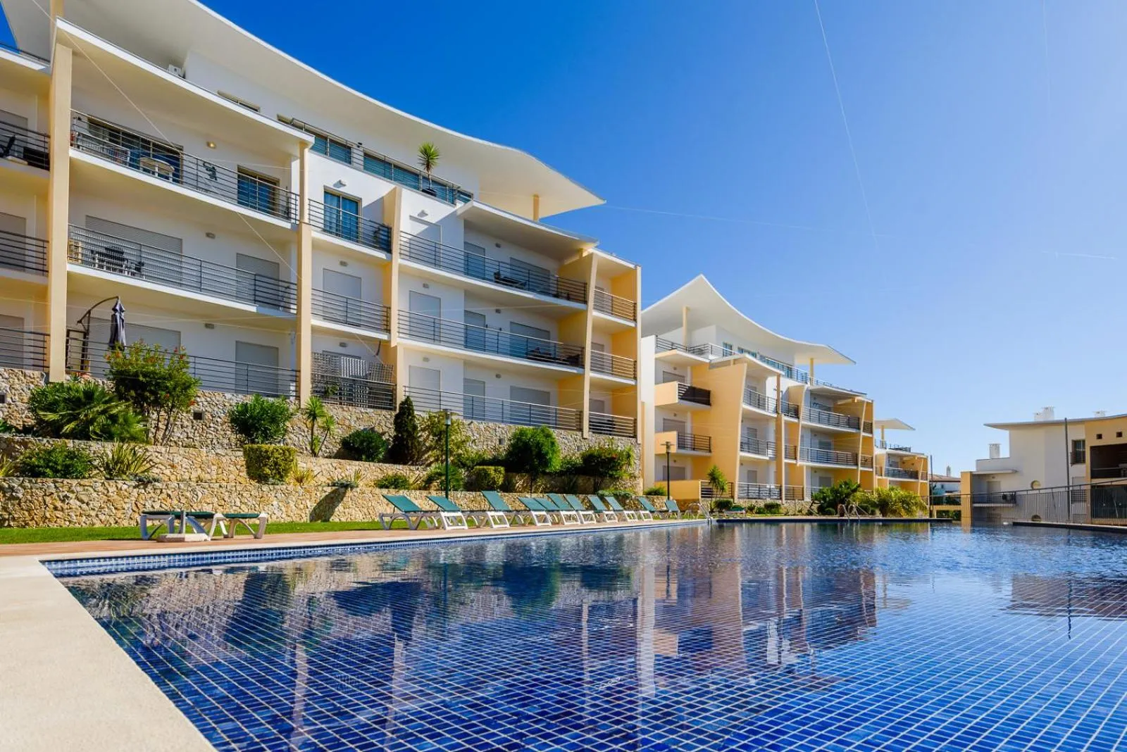 Property building in BnB Homes Ocean view Apartment with 3 spacious Terraces, 2 Swimming pools & Tennis court