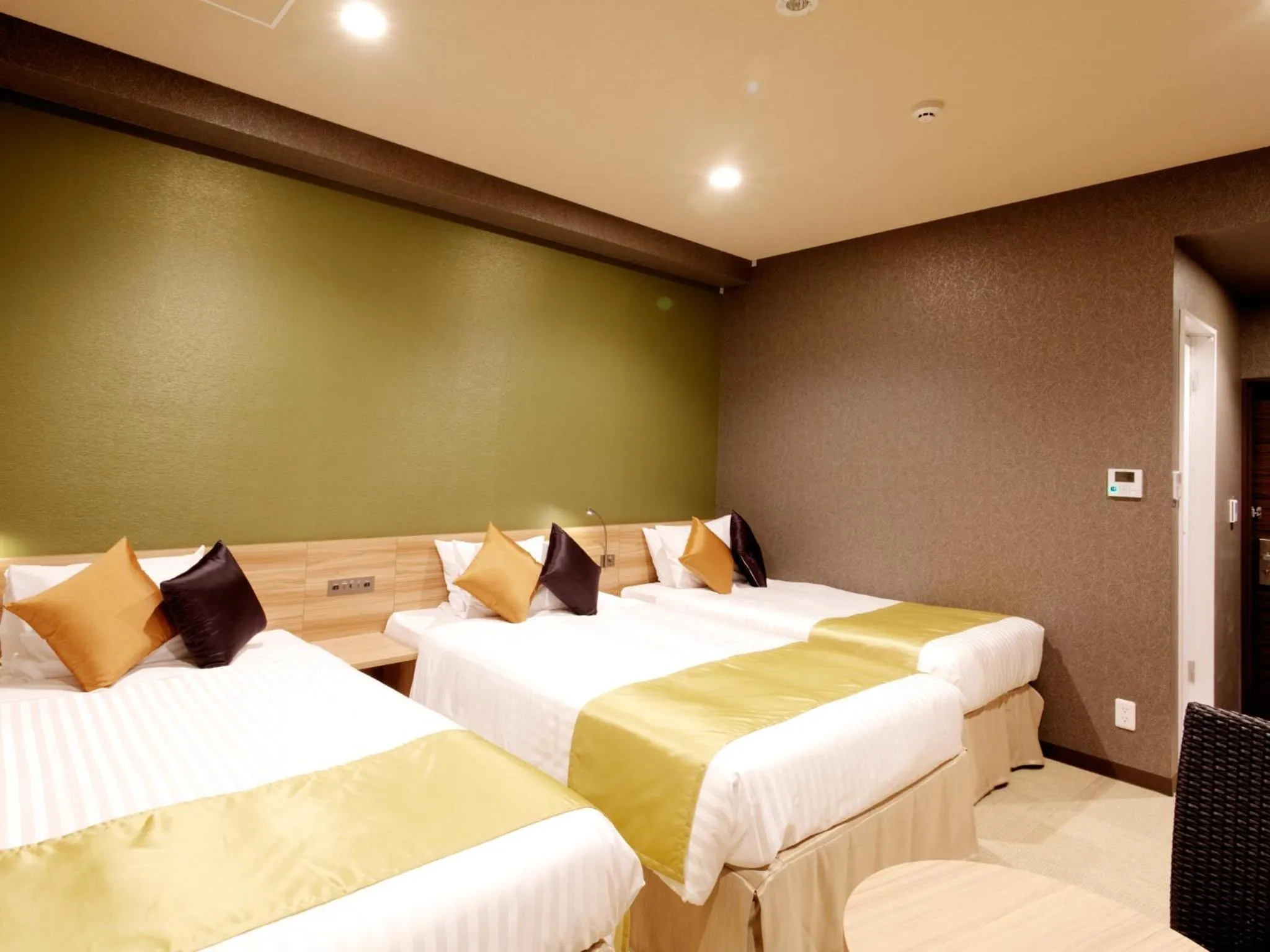 Photo of the whole room, Bed in Community & Spa Naha Central Hotel