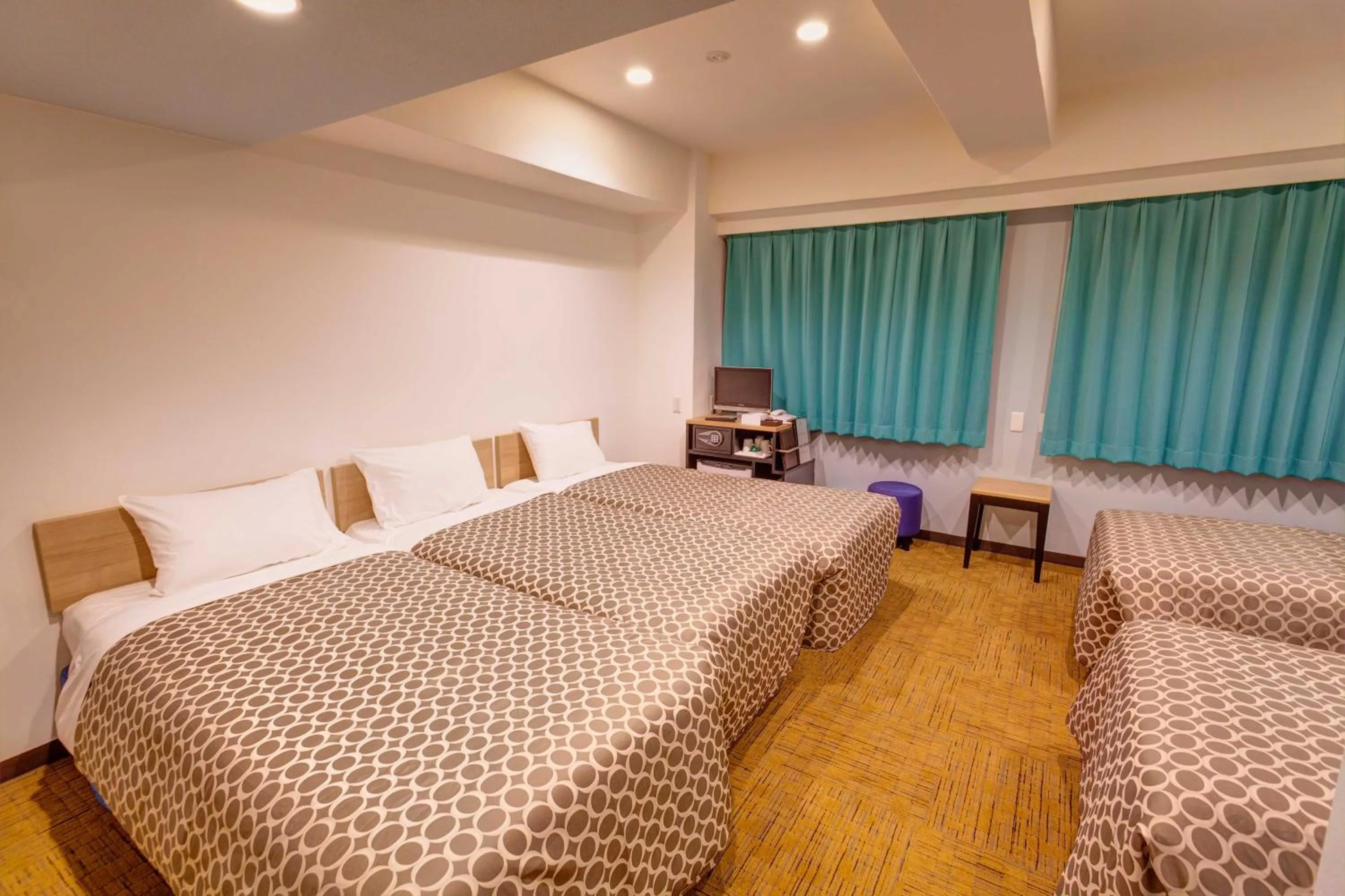 Photo of the whole room, Bed in Community & Spa Naha Central Hotel