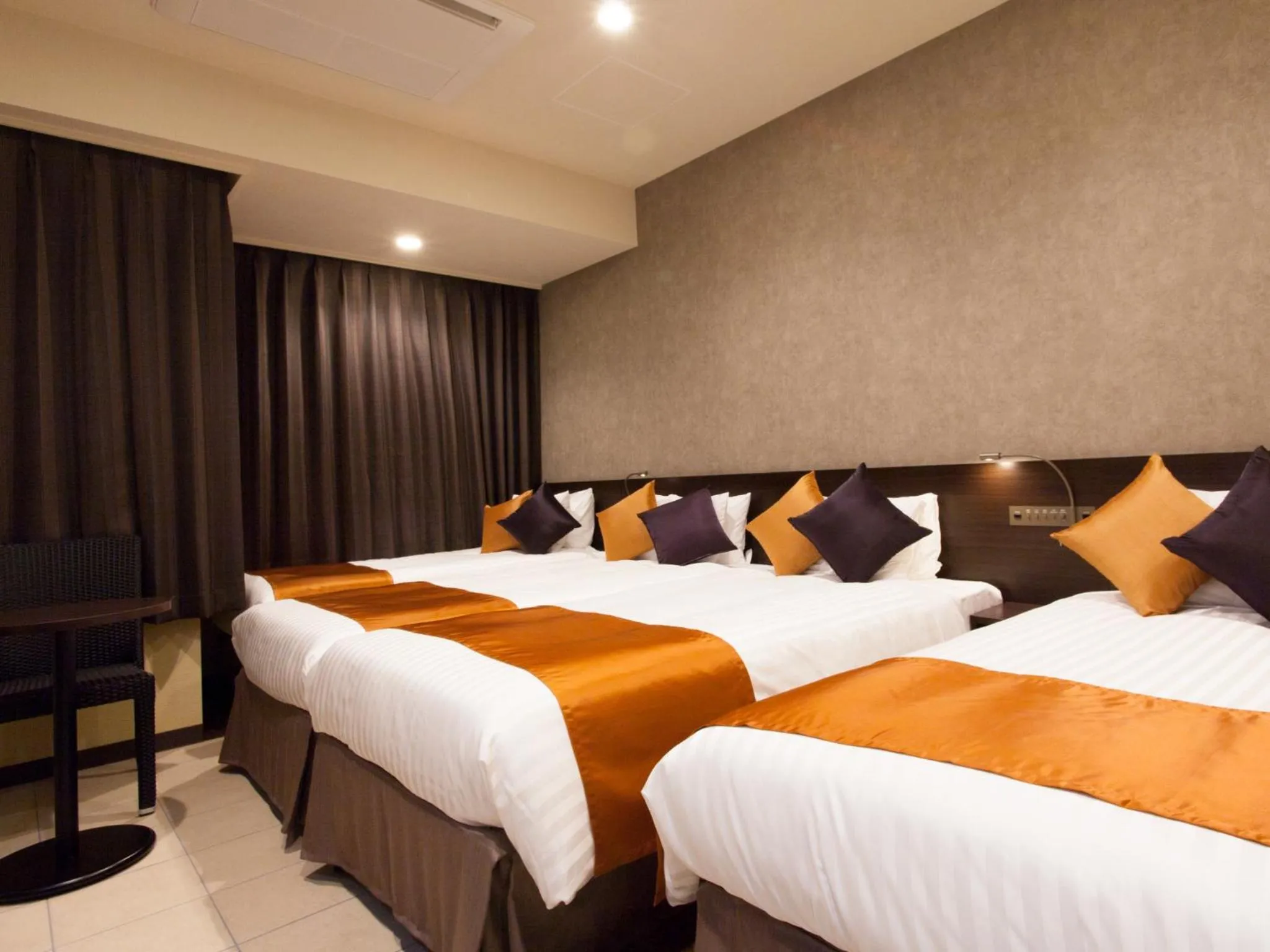 Photo of the whole room, Bed in Community & Spa Naha Central Hotel