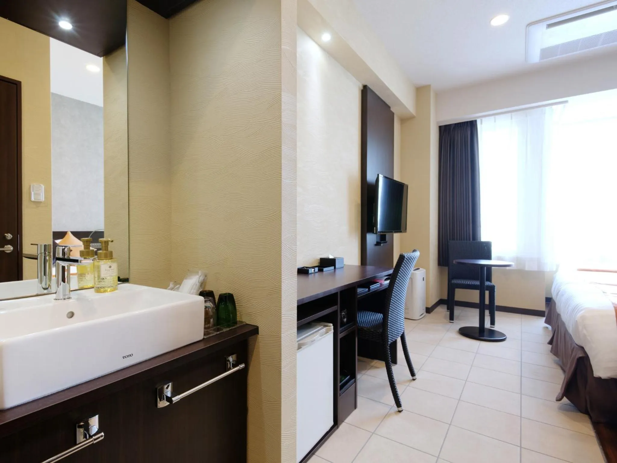 Photo of the whole room in Community & Spa Naha Central Hotel